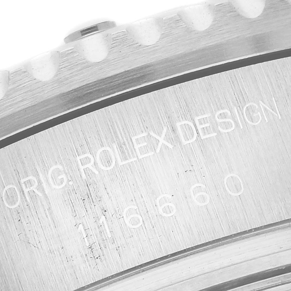 The image shows a close-up of the back case engraving on a Rolex Sea-Dweller 116660 Men
s Stainless Steel Black Dial 116660 Men
s Stainless Steel Black Dial watch, featuring the model number 116660.