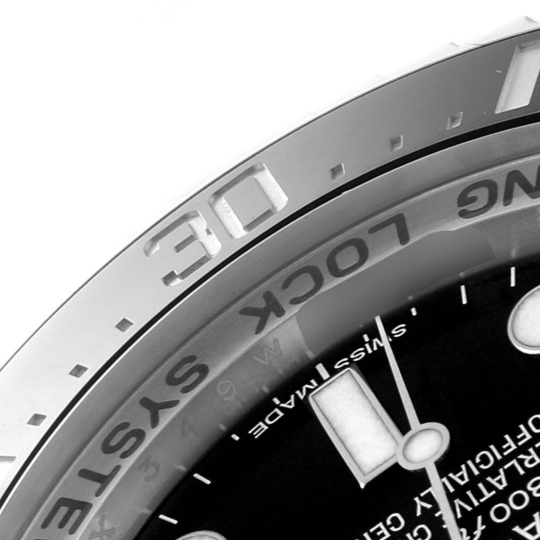 This image shows a close-up of the bezel and upper part of the dial of a Rolex Sea-Dweller 116660 Men
s Stainless Steel Black Dial 116660 Men
s Stainless Steel Black Dial watch.