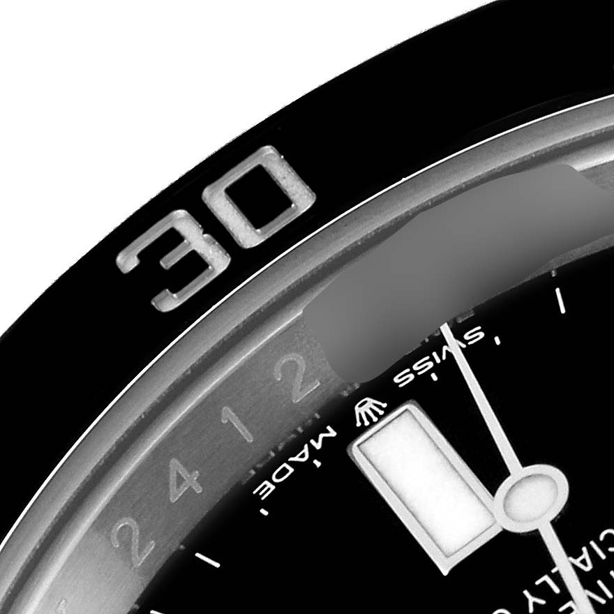 This close-up image shows part of the dial and bezel of a Rolex Submariner 126610 Men
s Stainless Steel Black Dial 126610 Men
s Stainless Steel Black Dial watch.