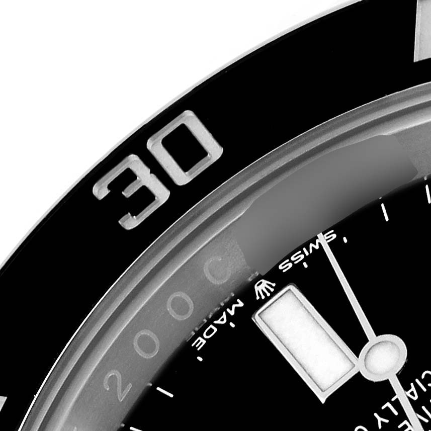 This image shows a close-up of the bezel, dial, and minute hand of a Rolex Submariner 126610 Men
s Stainless Steel Black Dial 126610 Men
s Stainless Steel Black Dial.