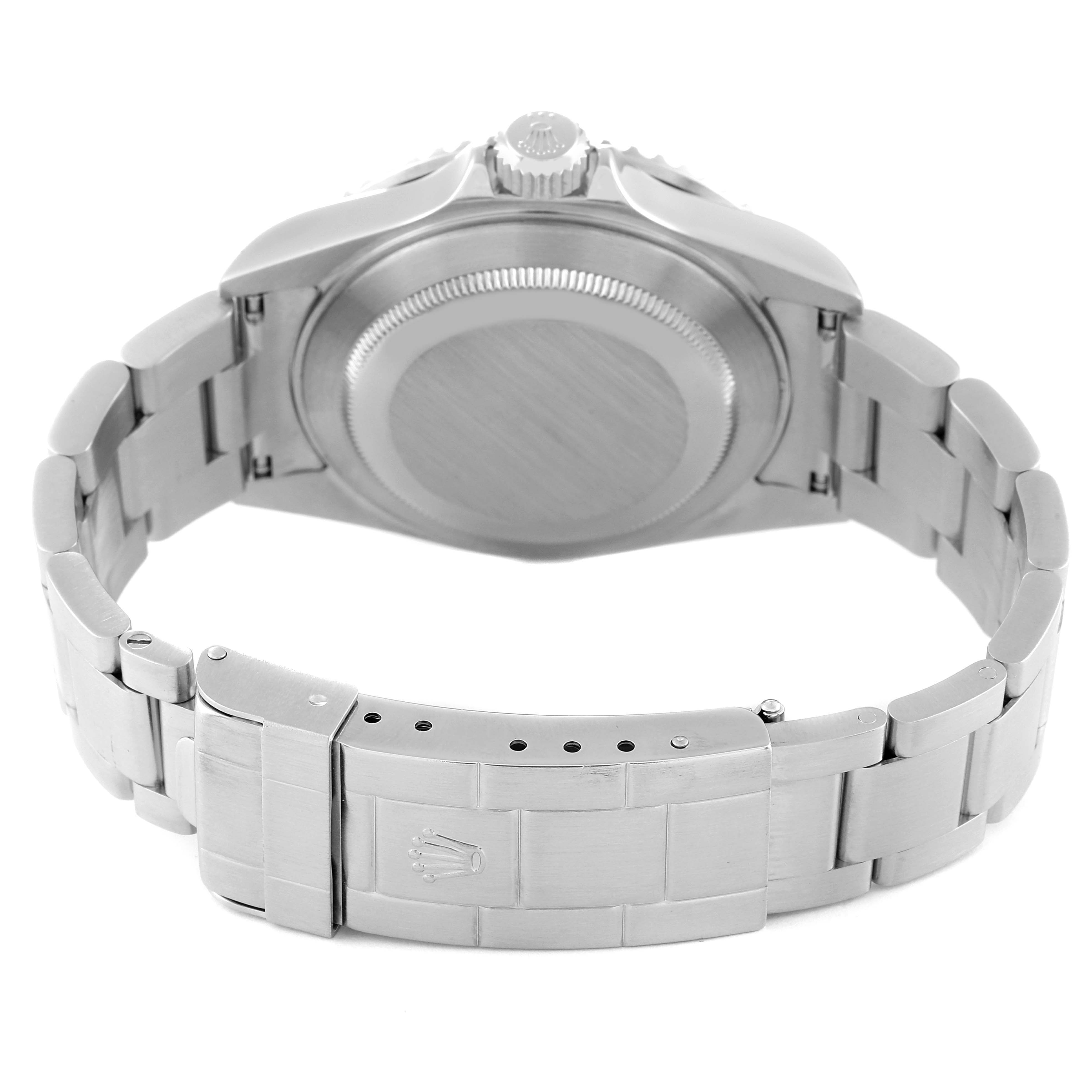 The image shows the back view of a Rolex Submariner 16610 Men
s Stainless Steel Black Dial 16610 Men
s Stainless Steel Black Dial watch, focusing on the case back and metal bracelet with clasp.