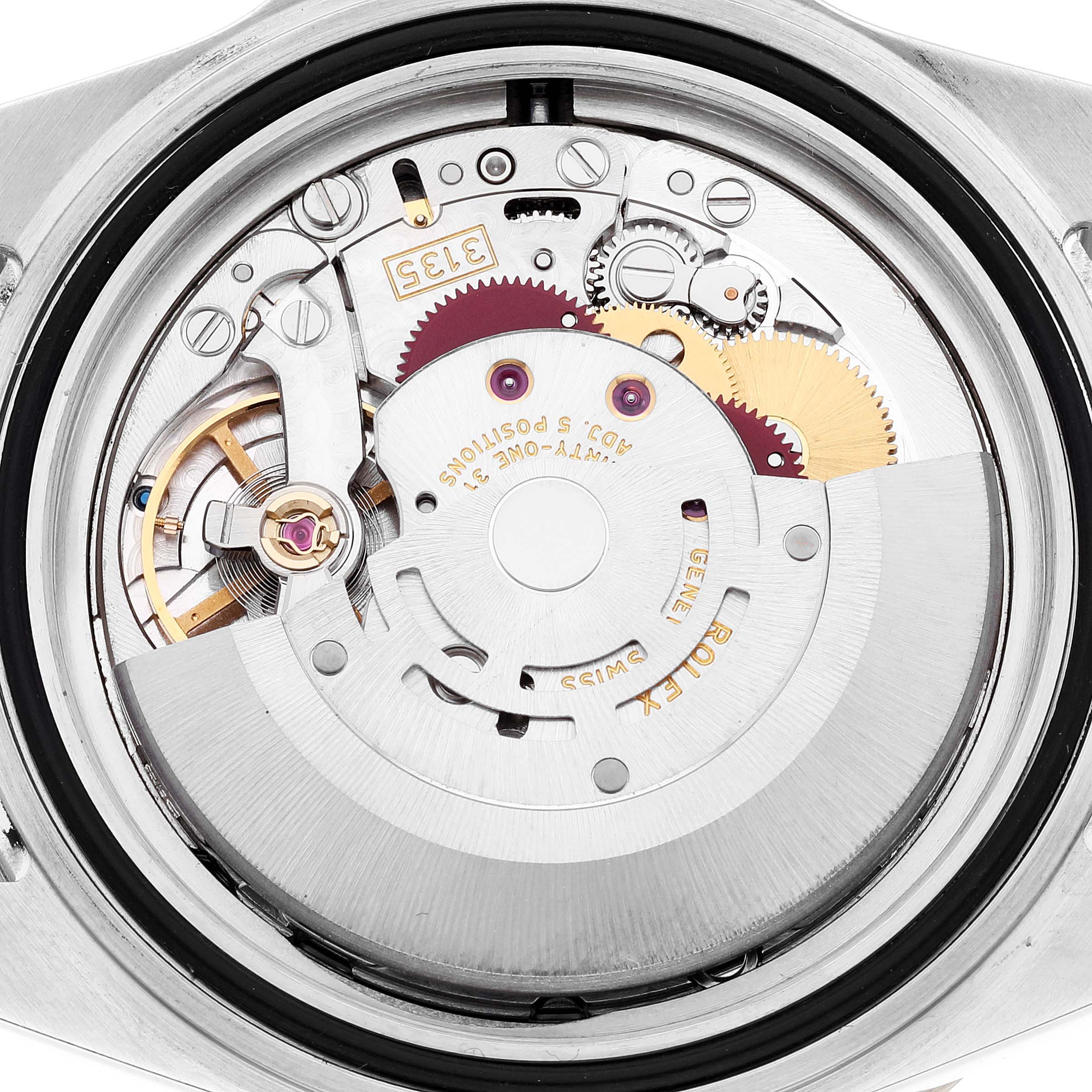 This is a close-up view of the movement inside a Rolex Submariner 16613 Men
s Steel and Gold (two tone) Blue Dial 16613 Men
s Steel and Gold (two tone) Blue Dial watch, showing its intricate mechanical parts.