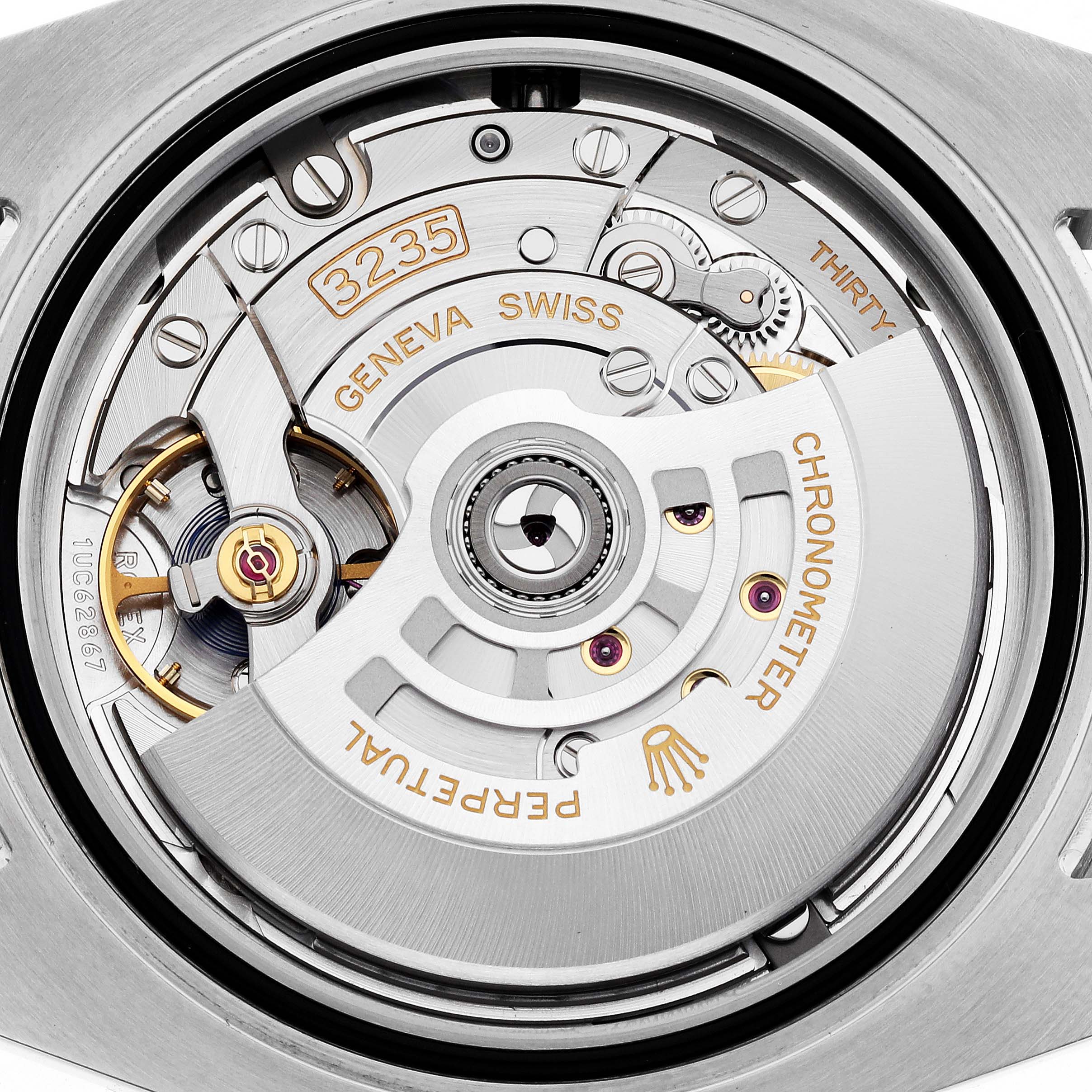 This is an image of the movement mechanism of a Rolex Submariner 126610LN Men's Stainless Steel Black Dial 126610LN Men's Stainless Steel Black Dial watch, viewed from the back.