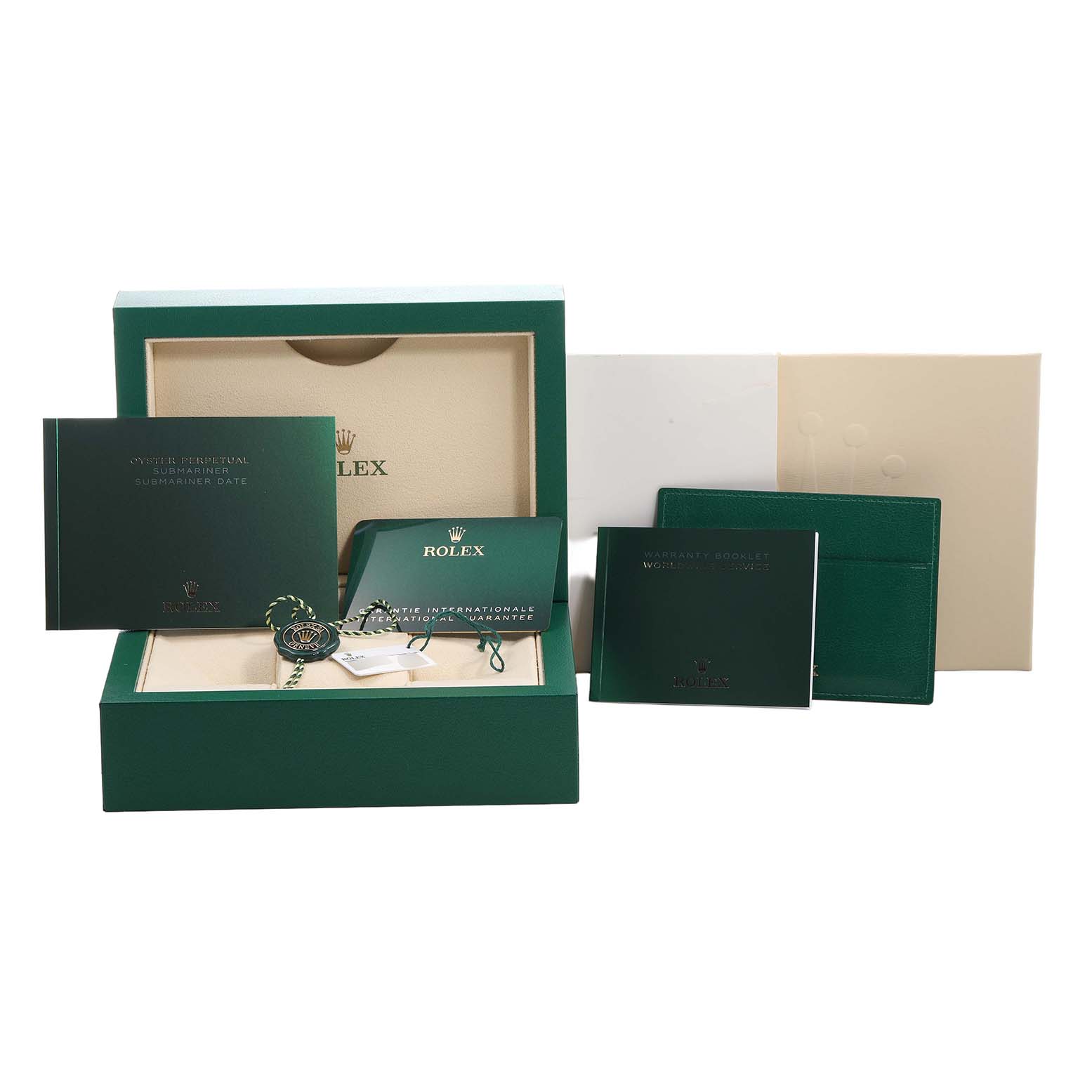 The image shows the packaging and accessories for a Rolex Submariner 126610LN Men's Stainless Steel Black Dial, including the box, manuals, and tags.