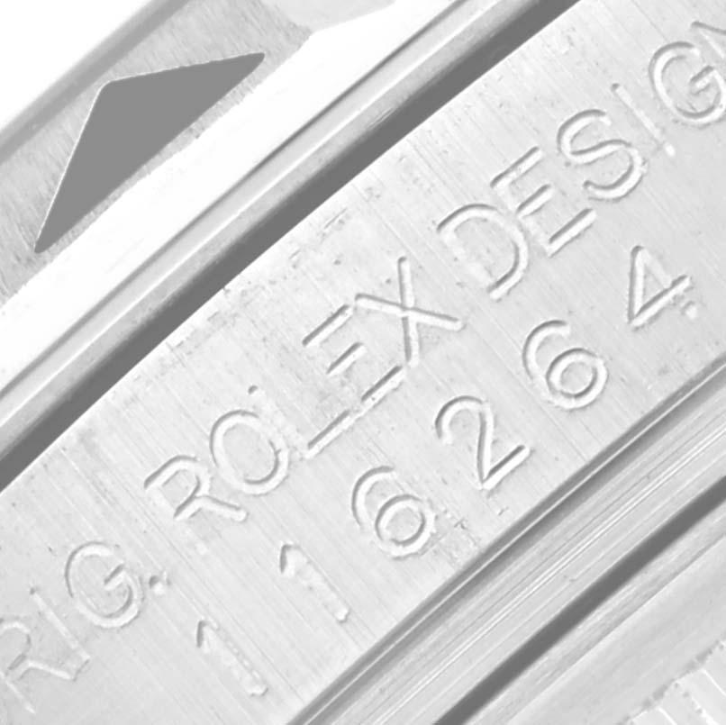 This close-up shows the engraved model and brand details on the side of the Rolex Turn-o-Graph 116264 Men's Stainless Steel Black Dial 116264 Men's Stainless Steel Black Dial watch case.