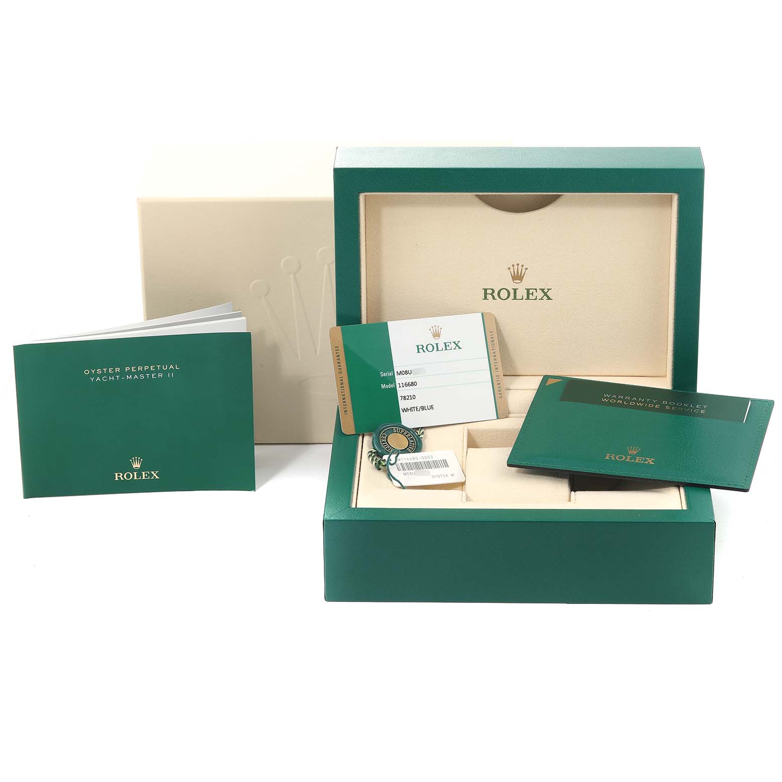 The image shows the packaging, manual, warranty card, and accessories for the Rolex Yacht-Master 116680 Men
s Stainless Steel White Dial 116680 Men
s Stainless Steel White Dial watch.