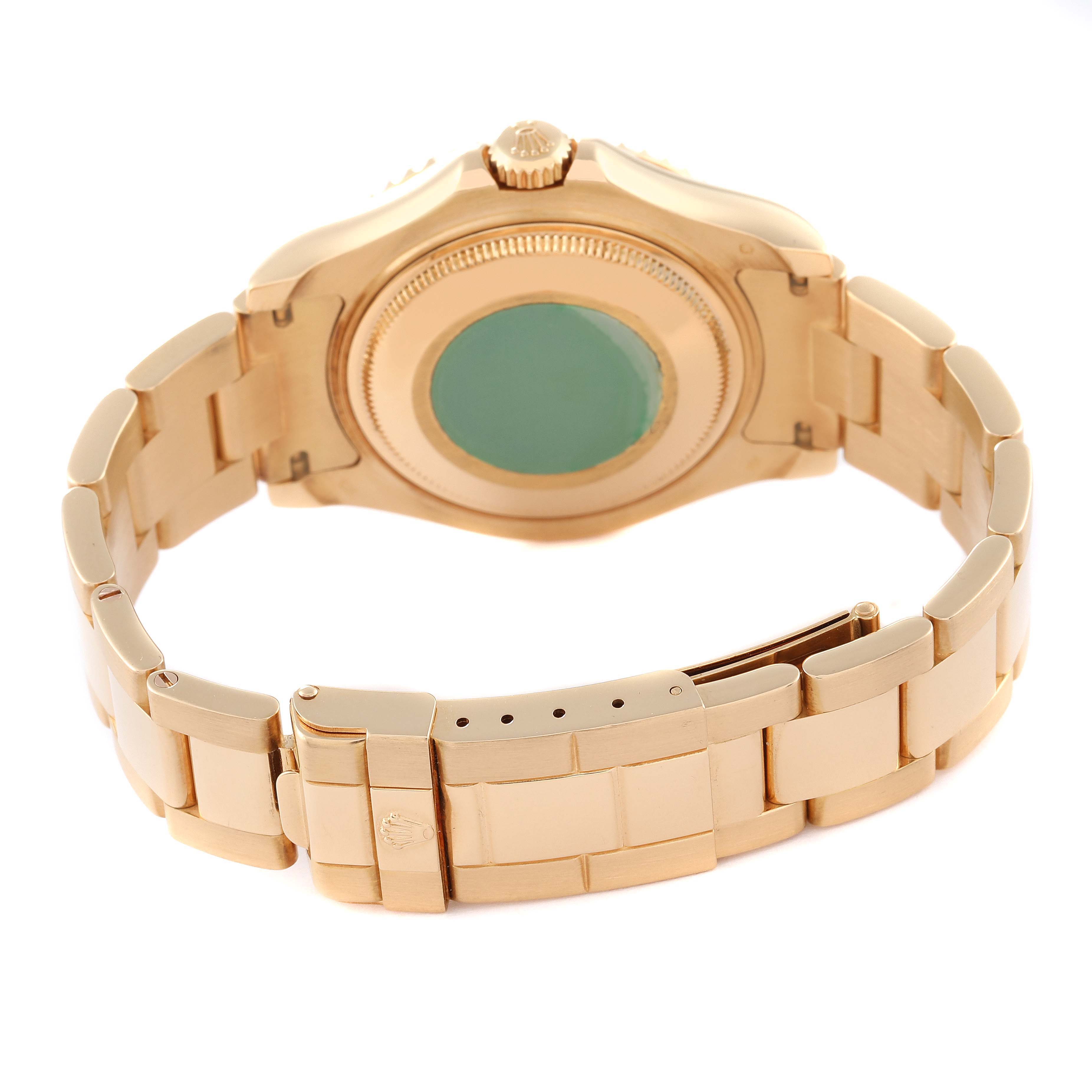 The image shows the back view of a Rolex Yacht-Master 68628 Men's Yellow Gold Blue Dial 68628 Men's Yellow Gold Blue Dial watch, highlighting its case back, crown, and bracelet.