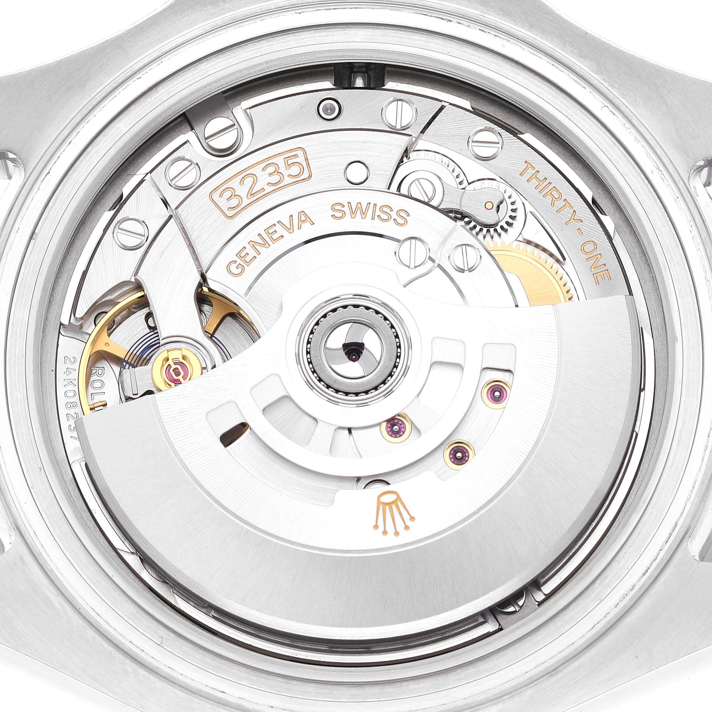 The image shows the backside of the Rolex Yacht-Master 126622 Men
s Stainless Steel Grey Dial 126622 Men
s Stainless Steel Grey Dial watch, focusing on its intricate movement mechanism and rotor.