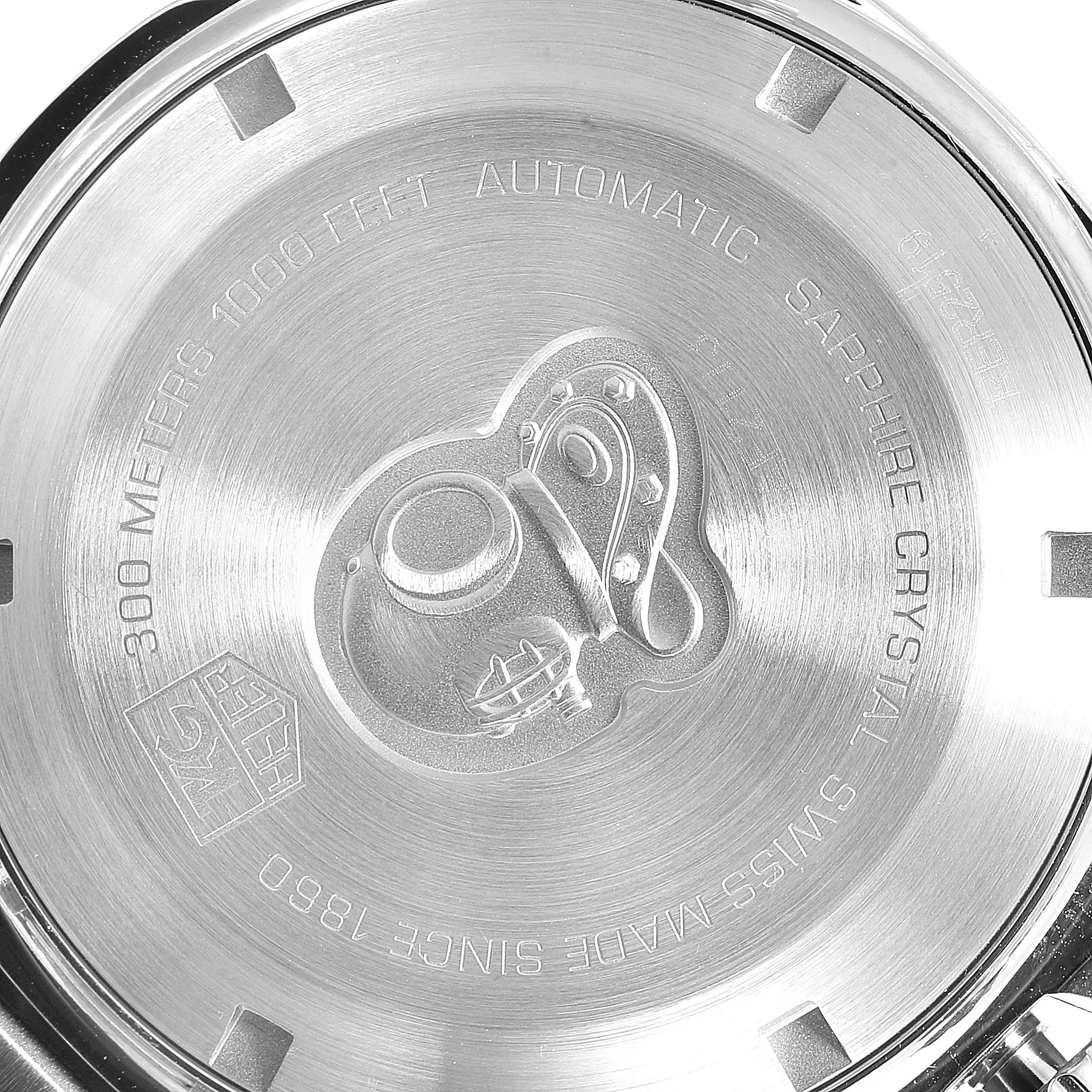 This image shows the case back of a Tag Heuer Aquaracer CAF2113.BA0809 Men's Stainless Steel Black Dial CAF2113.BA0809 Men's Stainless Steel Black Dial watch, featuring engravings and a diving helmet emblem.