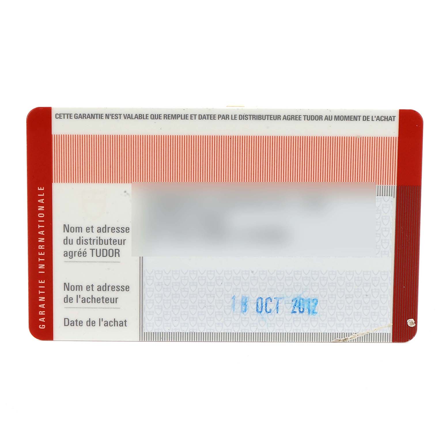 This image shows the warranty card for the Tudor Clair de Rose 35701 Women's Steel and Gold (two tone) Mother of Pearl Dial 35701 Women's Steel and Gold (two tone) Mother of Pearl Dial watch, featuring distributor and purchaser information.