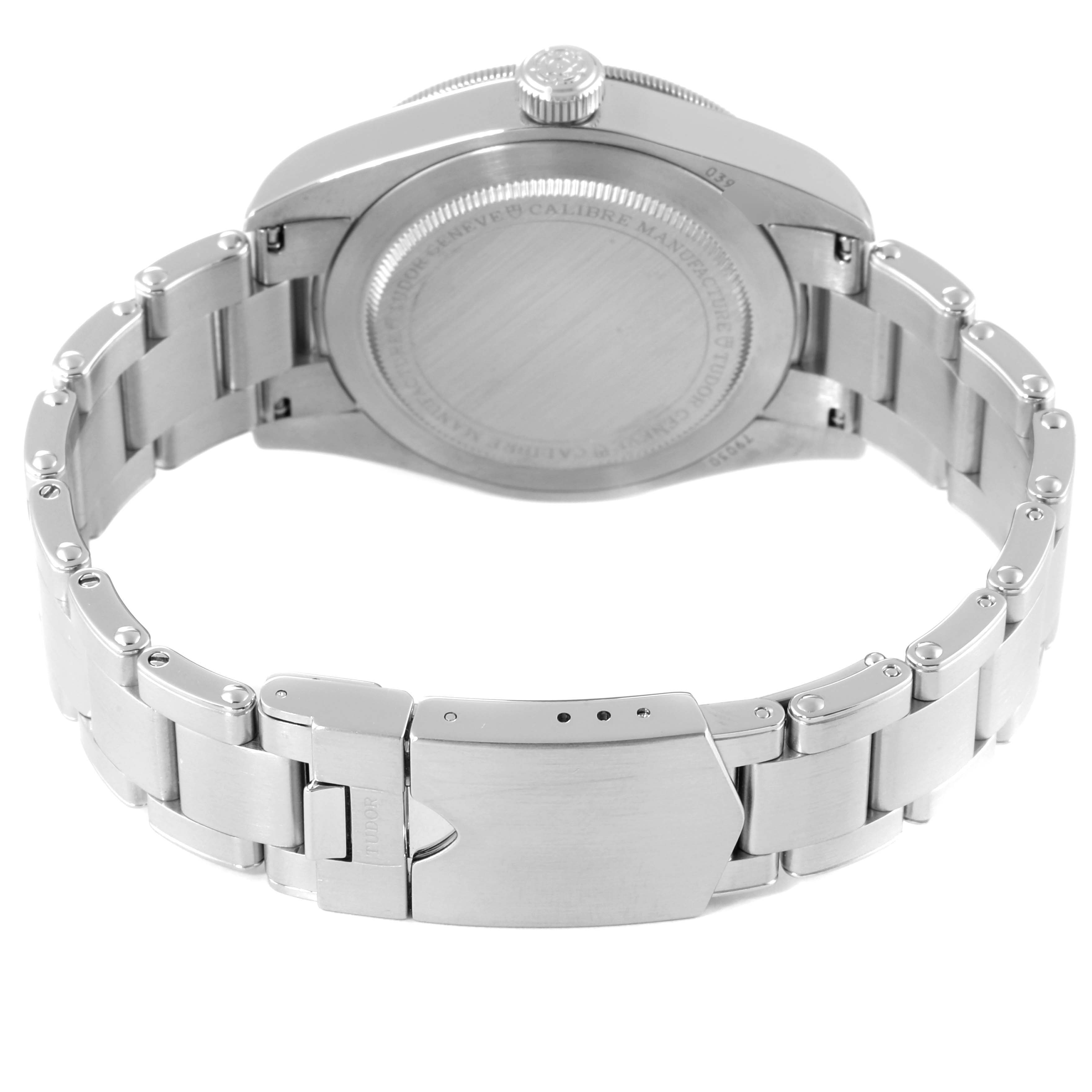 The image shows the back case and clasp of the Tudor Heritage Black Bay 79030B Men's Stainless Steel Blue Dial 79030B Men's Stainless Steel Blue Dial watch at an angle.