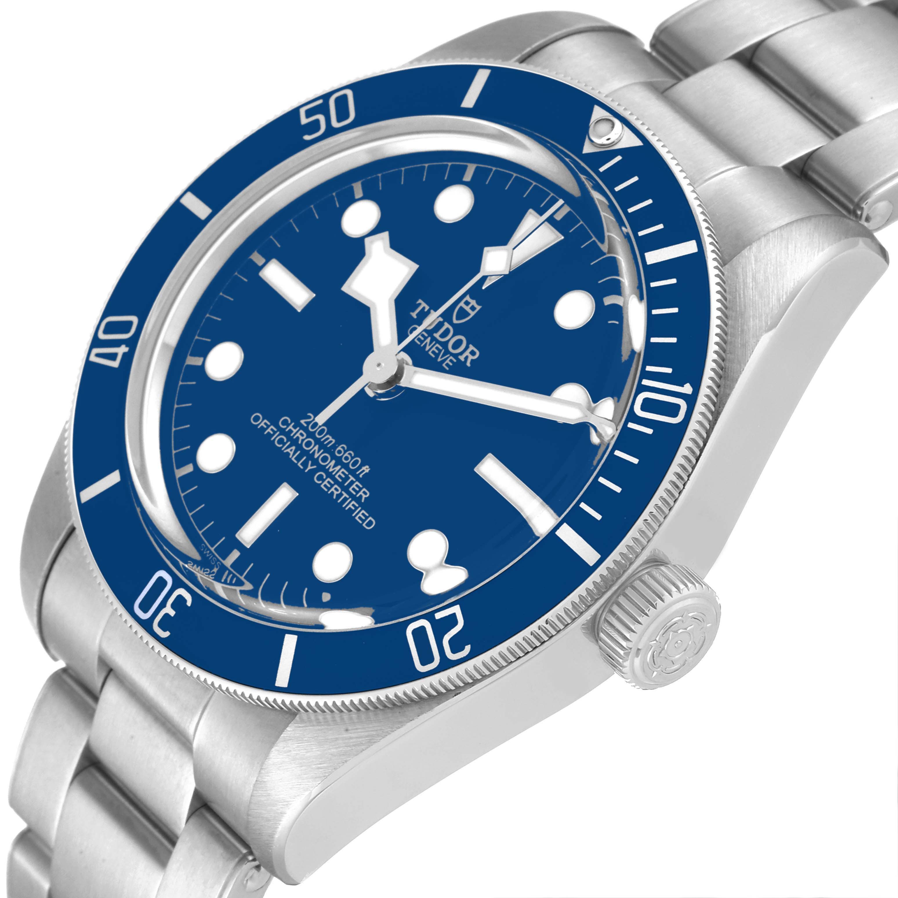 The image shows a Tudor Heritage Black Bay 79030B Men's Stainless Steel Blue Dial 79030B Men's Stainless Steel Blue Dial watch from an angled top view, displaying the bezel, dial, crown, and part of the bracelet.