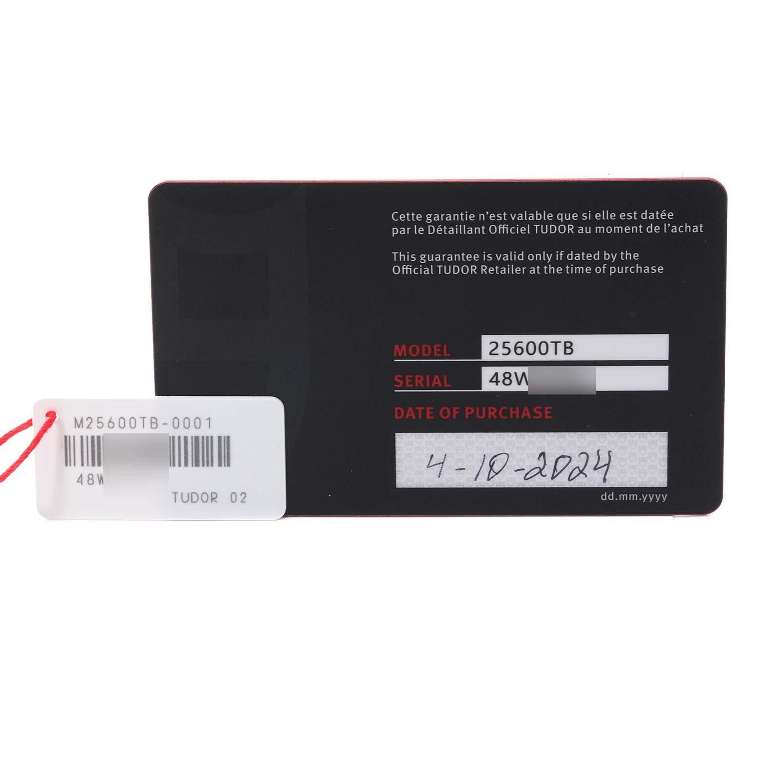 The image shows the warranty card for a Tudor Pelagos 25600TB Men's Titanium Blue Dial 25600TB Men's Titanium Blue Dial model 25600TB, displaying the model, serial number, and date of purchase.