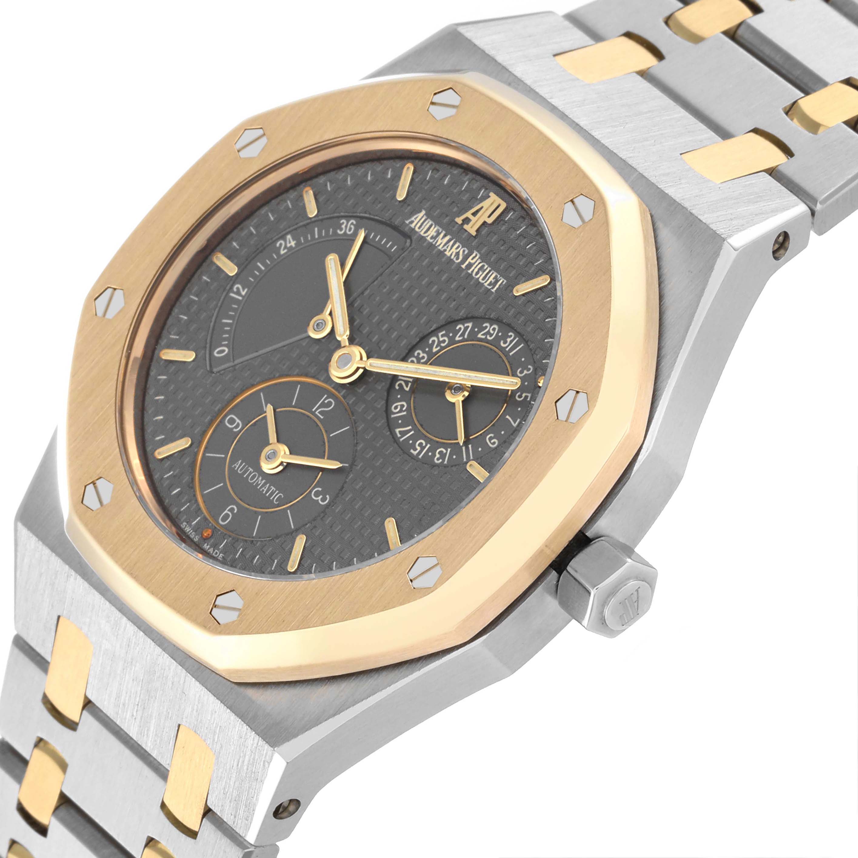 The image shows a close-up of a Royal Oak by Audemars Piguet, highlighting the dial, bezel, and part of the bracelet.