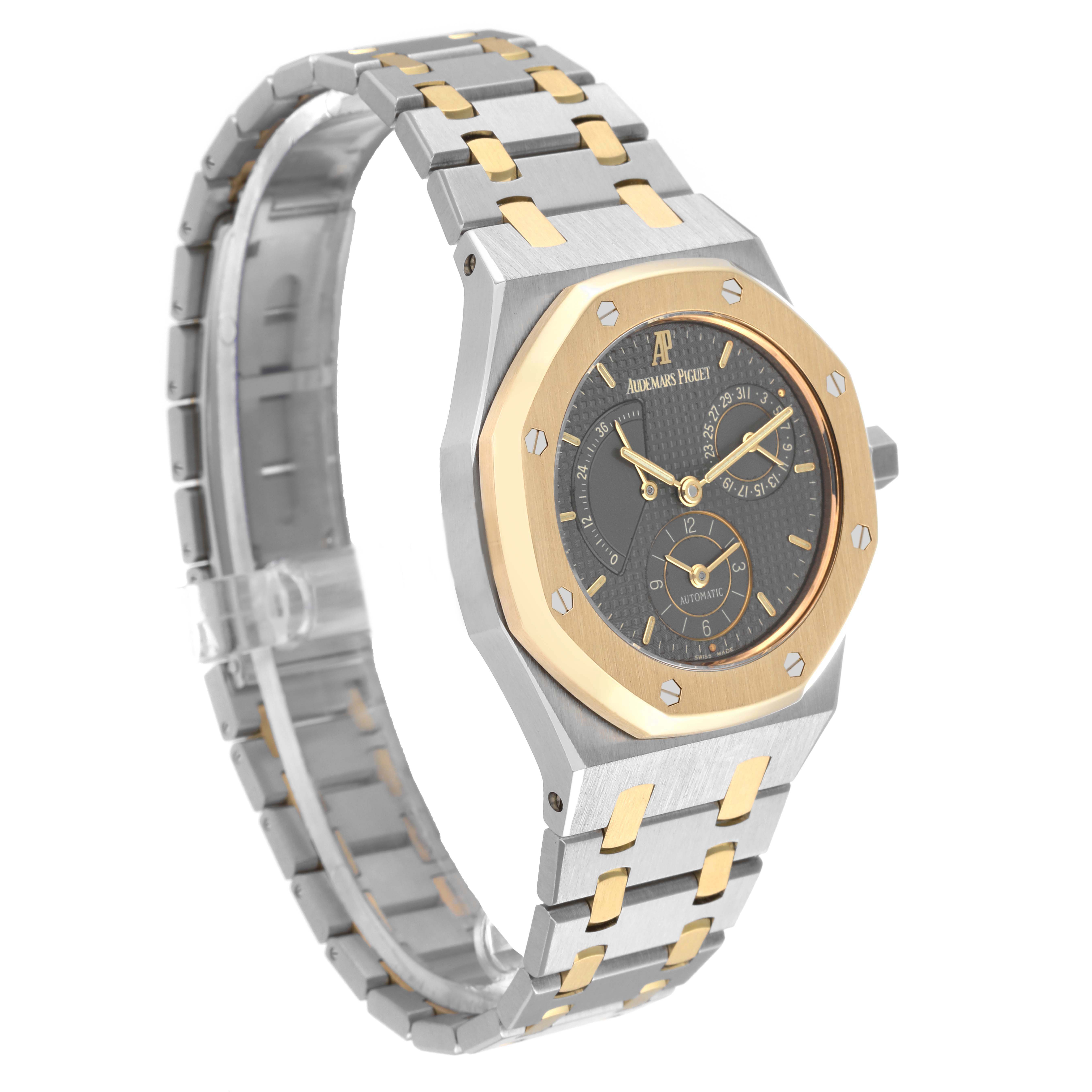 This is a side-angle image of an Audemars Piguet Royal Oak 25730SA.01.078 Men's Steel and Gold (two tone) Grey Dial 25730SA.01.078 Men's Steel and Gold (two tone) Grey Dial watch, showcasing its gold and silver bracelet and octagonal bezel with screws.