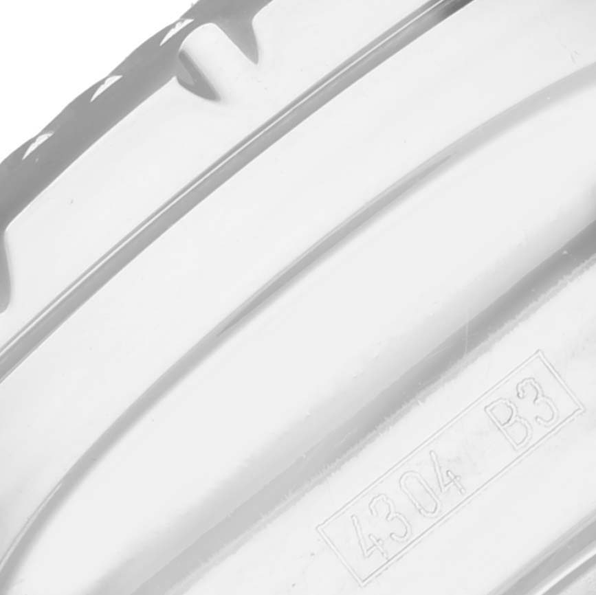 This close-up of the Bentley model by Breitling shows a portion of the outer casing or bezel with engraved details.