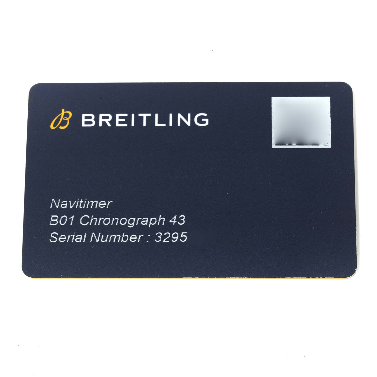This is a straight-on view of a Breitling Navitimer AB0121 Men's Stainless Steel Grey Dial AB0121 Men's Stainless Steel Grey Dial B01 Chronograph 43 serial number card.