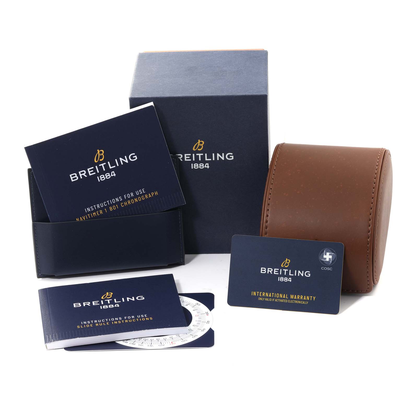 The image shows the packaging, instruction booklets, international warranty card, and a leather case for the Breitling Navitimer AB0121 Men's Stainless Steel Grey Dial AB0121 Men's Stainless Steel Grey Dial watch.