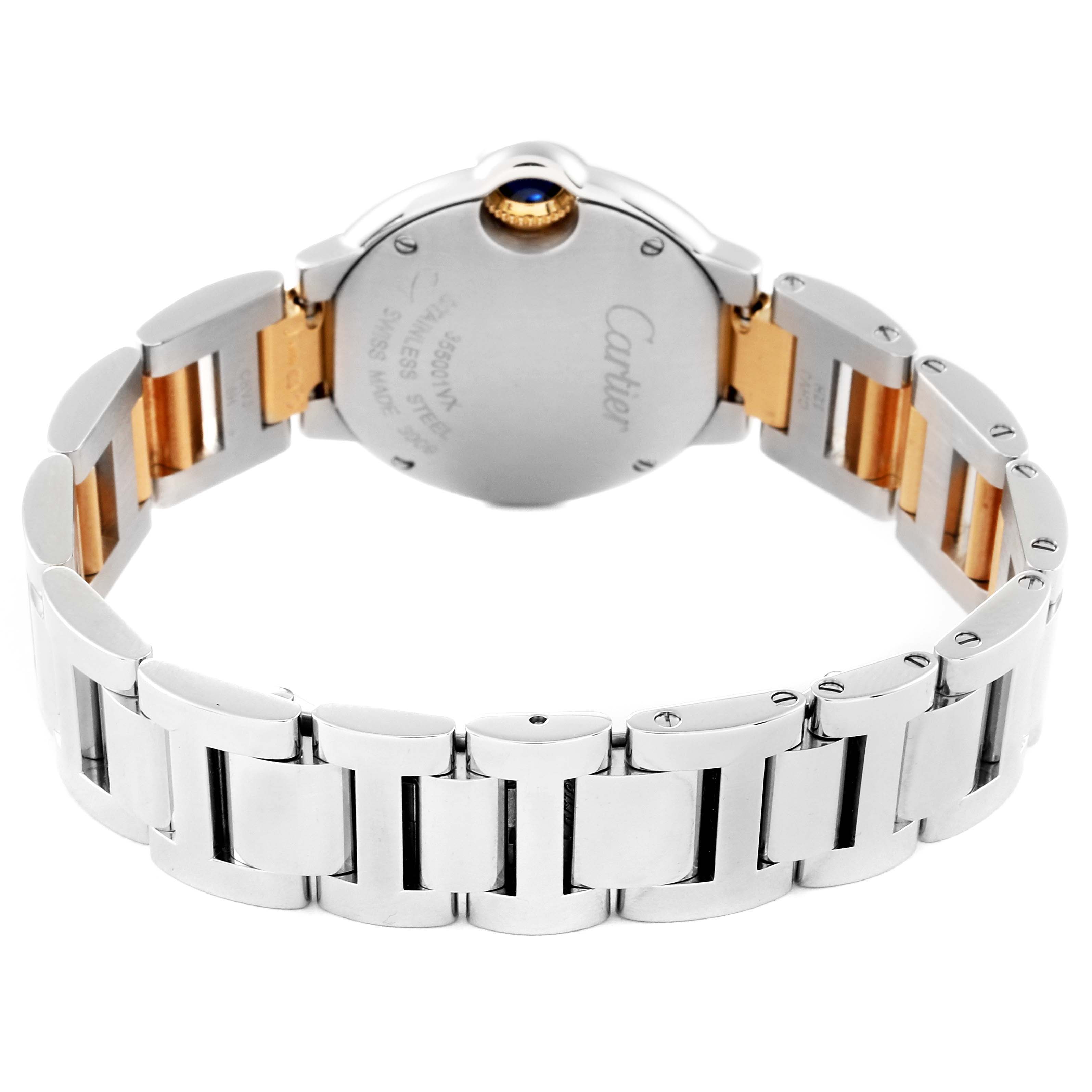 The image shows the back view of the Ballon Bleu model by Cartier, featuring its stainless steel and gold bracelet.