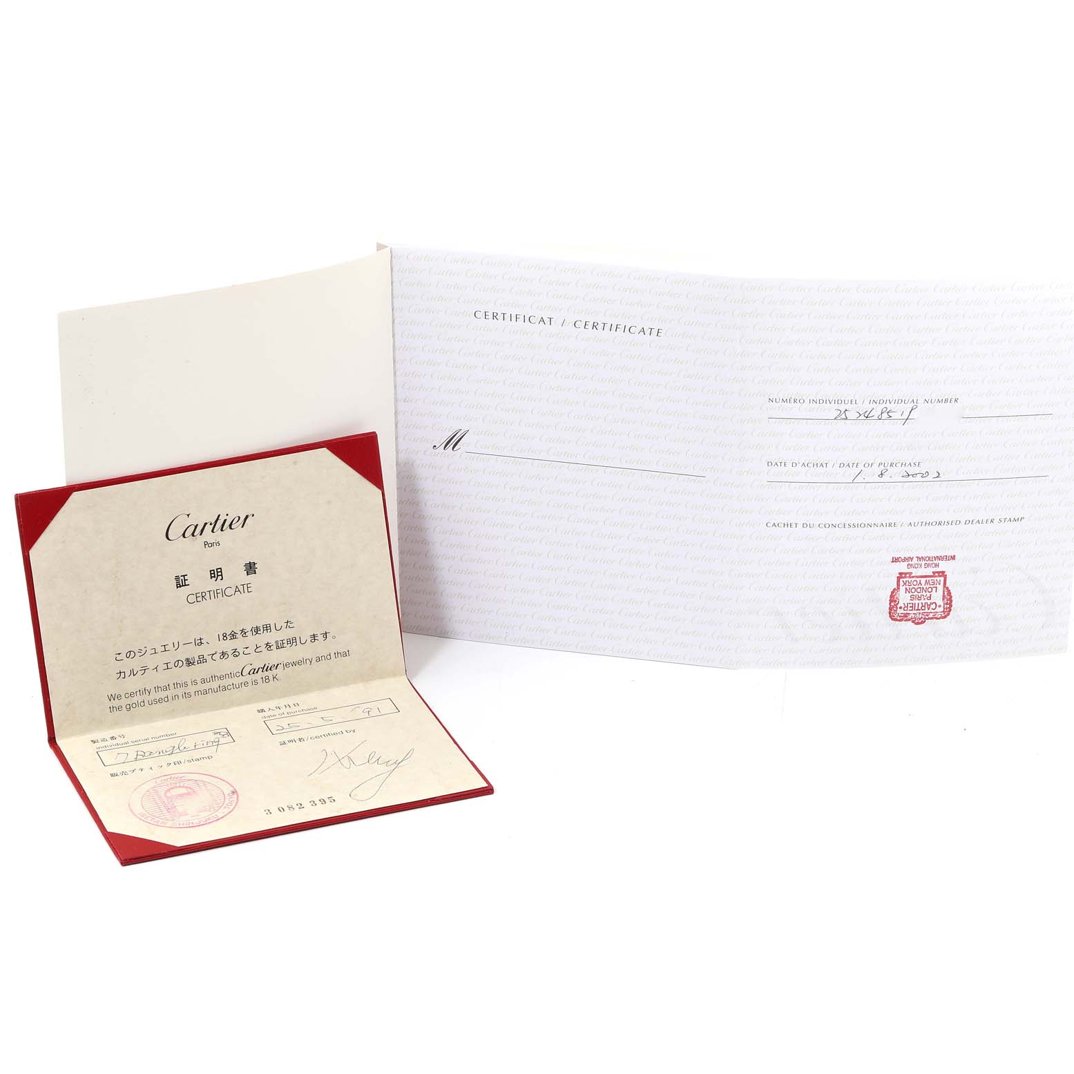 The image shows the certificate of authenticity and warranty paperwork for the Cartier Roadster W62003V1 Men's Yellow Gold Silver Dial W62003V1 Men's Yellow Gold Silver Dial model watch.