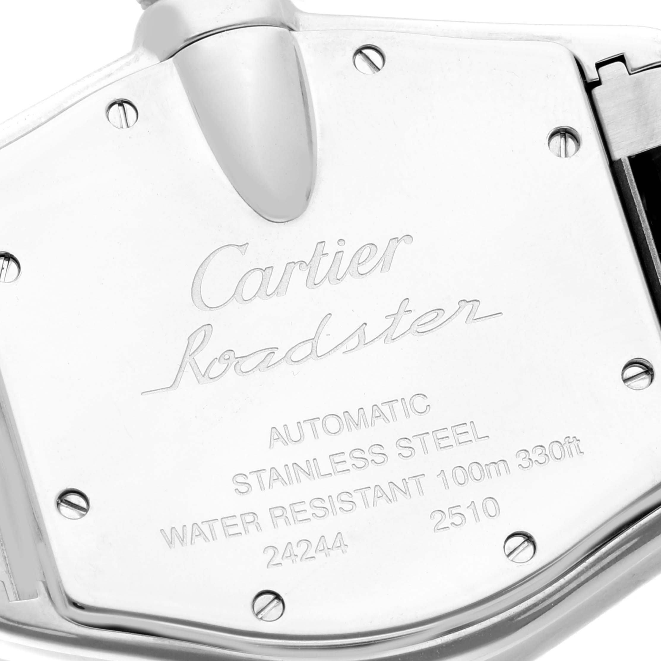 This image shows the stainless steel back casing of a Cartier Roadster W62041V3 Men's Stainless Steel Black Dial W62041V3 Men's Stainless Steel Black Dial watch, viewed at an angle highlighting its engraved details.
