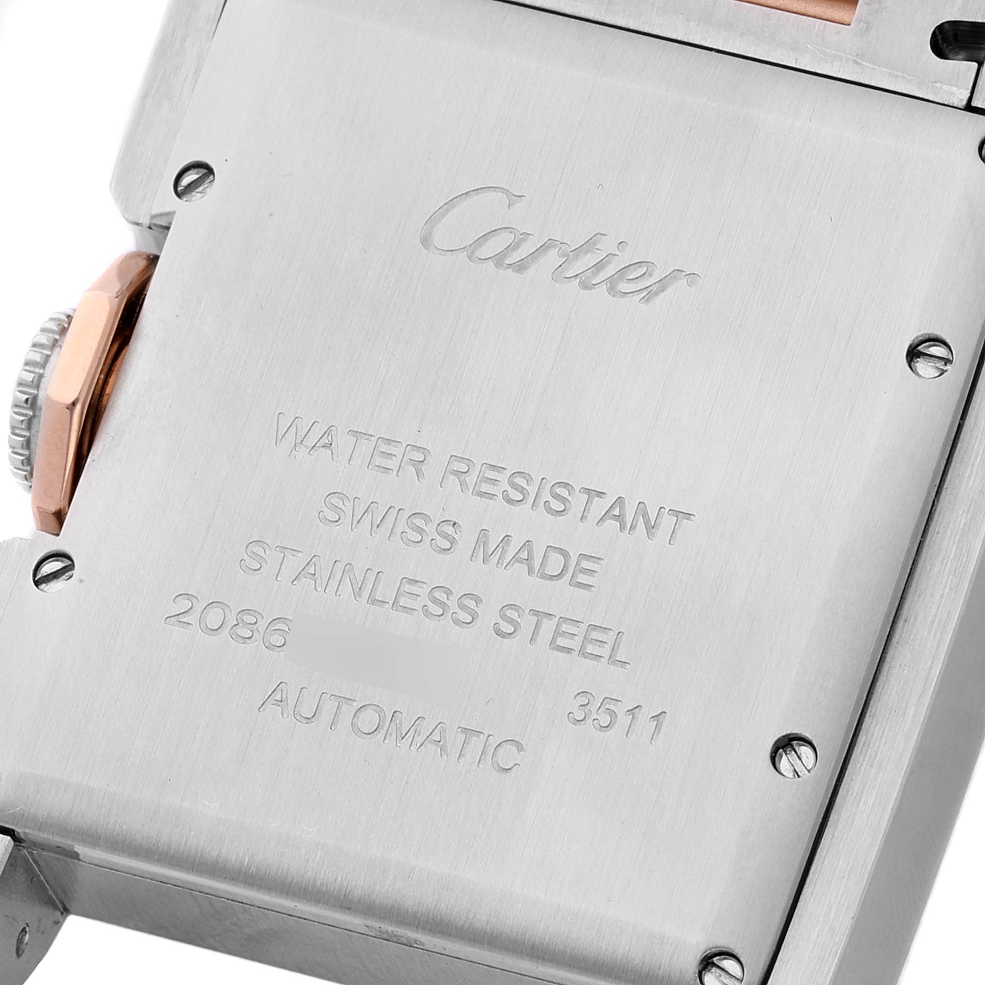 This image shows the back of a Cartier Tank Anglaise WT100025 Women's Steel and Gold (two tone) Silver Dial WT100025 Women's Steel and Gold (two tone) Silver Dial watch, highlighting its stainless steel case and engraved details.