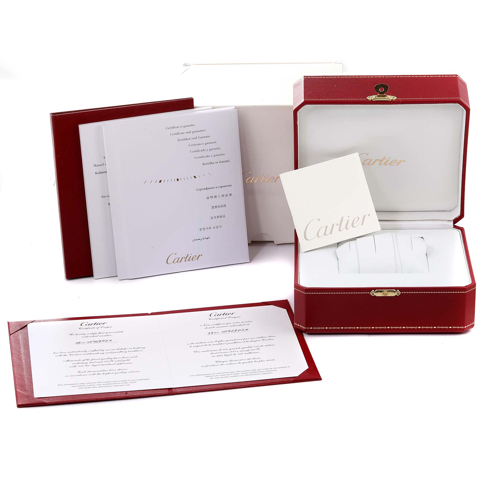 This image includes the packaging, manuals, and certificates for the Cartier Tank Anglaise WT100025 Women's Steel and Gold (two tone) Silver Dial WT100025 Women's Steel and Gold (two tone) Silver Dial watch model.