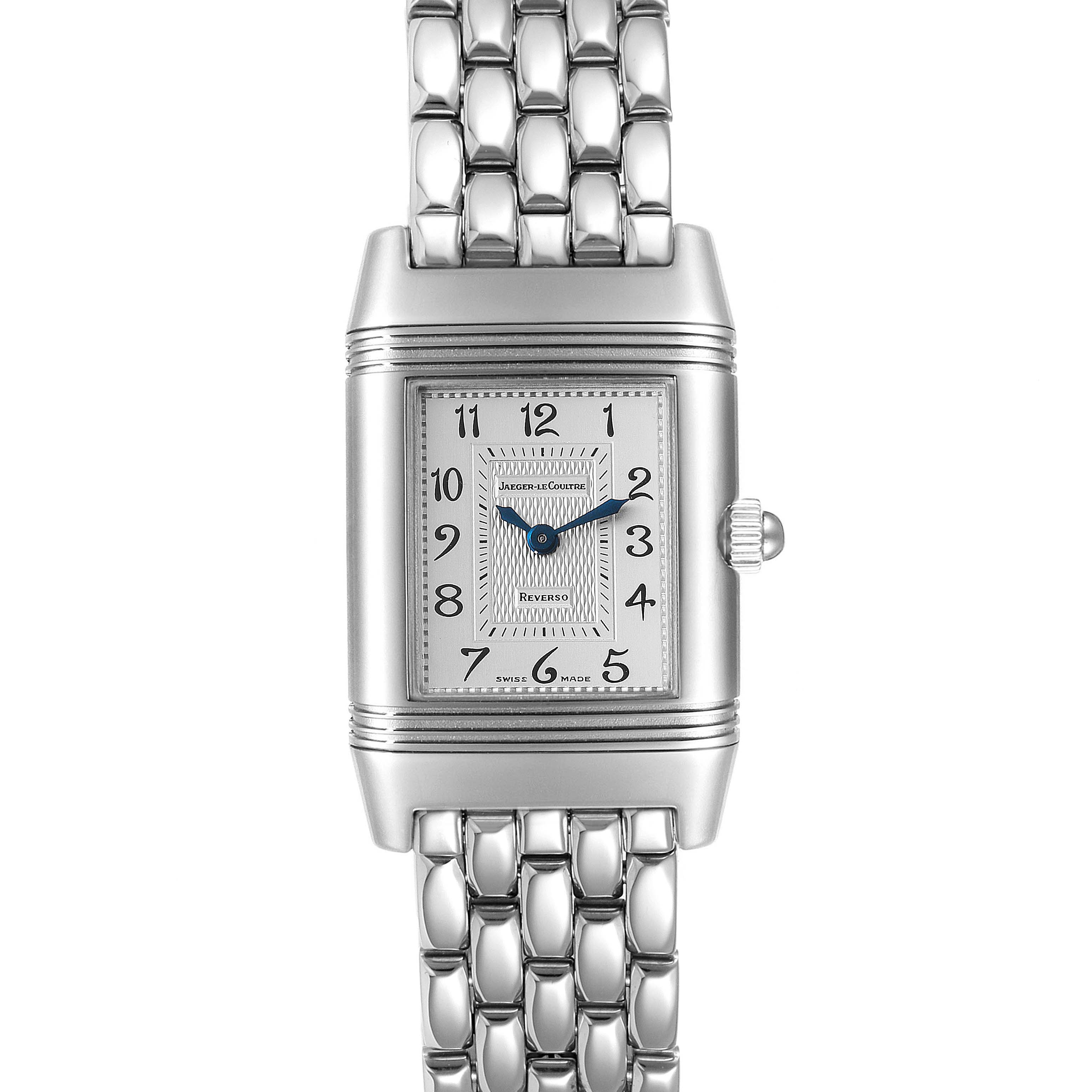 The image shows a front view of the Jaeger-LeCoultre Reverso watch, featuring its rectangular face and metal bracelet.
