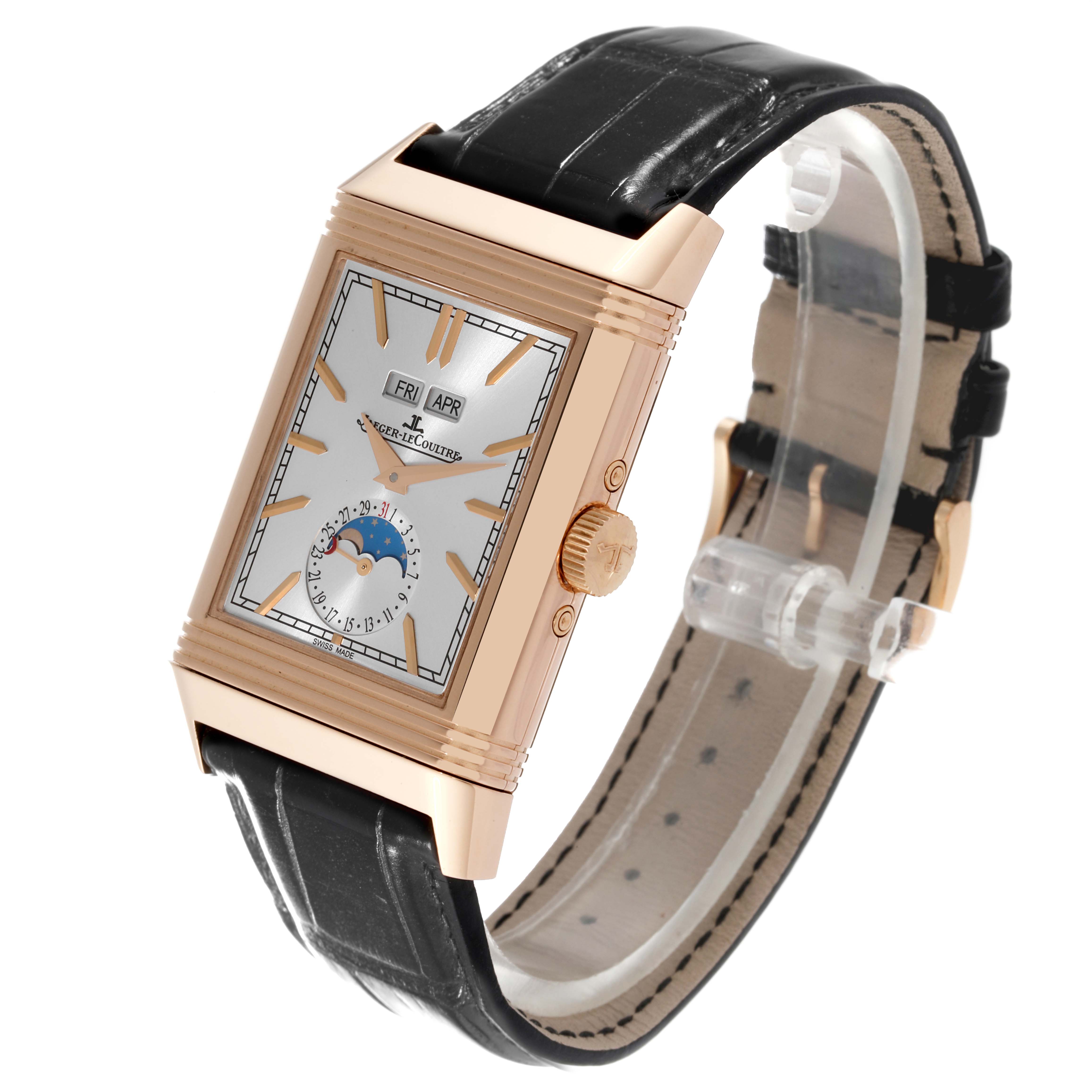 This Jaeger-LeCoultre Reverso watch is shown at a three-quarter angle, highlighting its rectangular face, crown, and black leather strap.