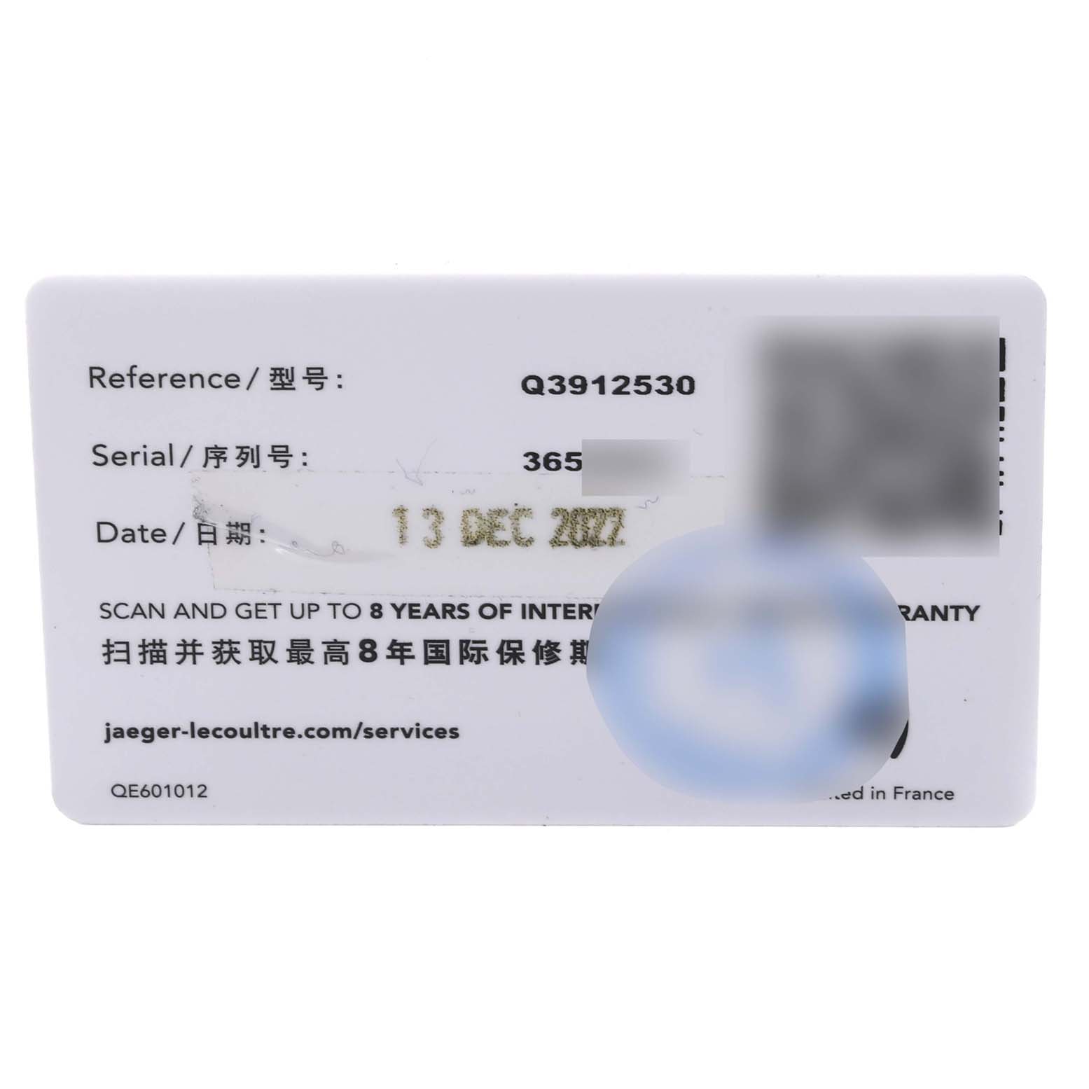 This image shows a warranty card for the Reverso model by Jaeger LeCoultre, featuring its reference and serial numbers.