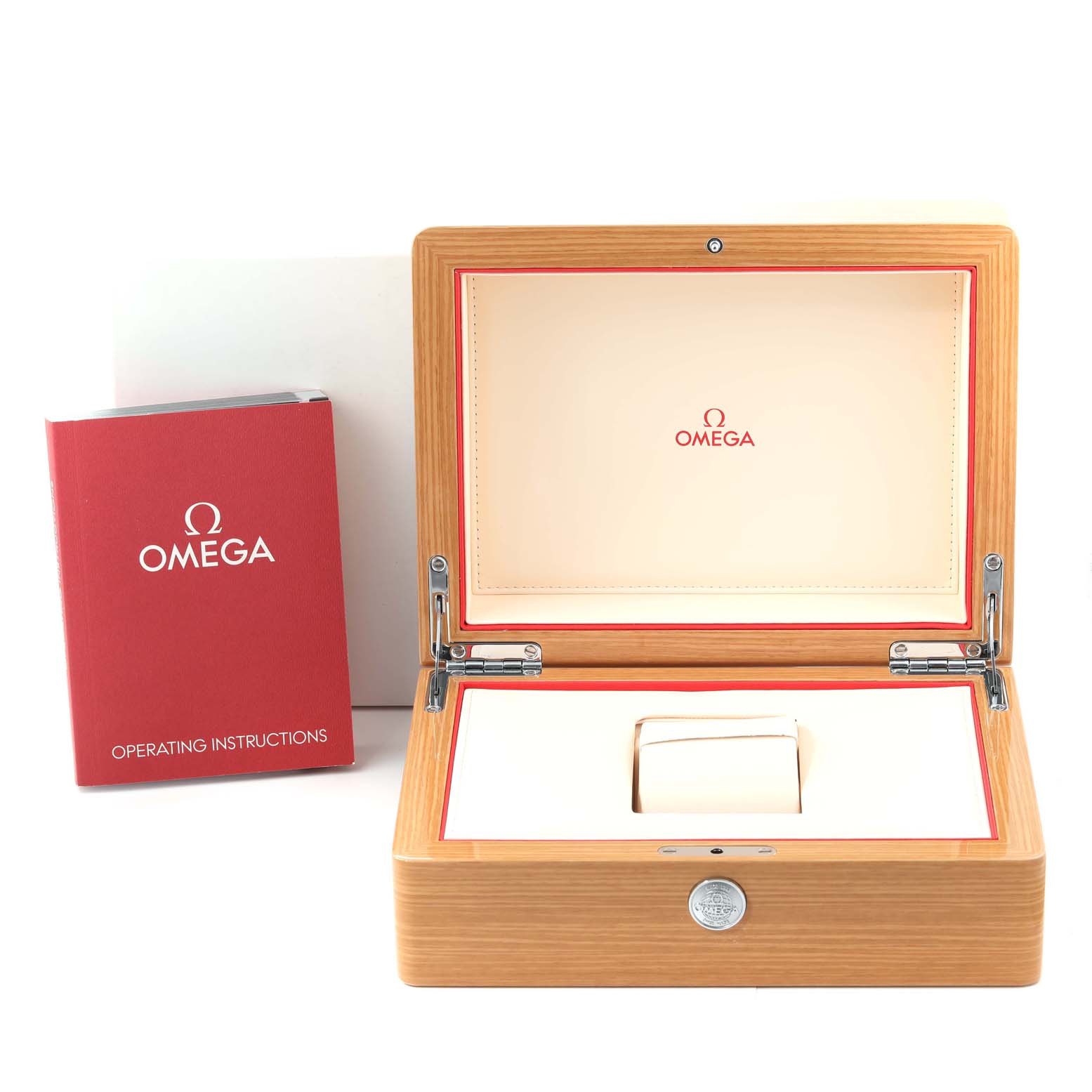 The image shows an open Omega Seamaster 212.30.44.52.01.001 Men's Stainless Steel Black Dial 212.30.44.52.01.001 Men's Stainless Steel Black Dial watch box with an instruction manual beside it.