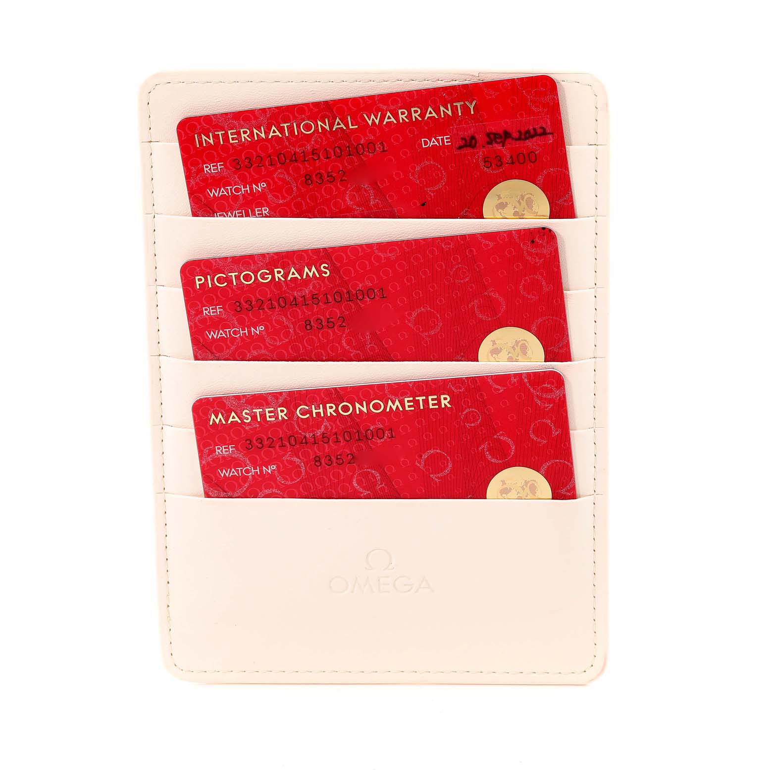 This image shows three Omega Speedmaster 332.10.41.51.01.001 Men
s Stainless Steel Black Dial 332.10.41.51.01.001 Men
s Stainless Steel Black Dial cards: International Warranty, Pictograms, and Master Chronometer, in a white cardholder.