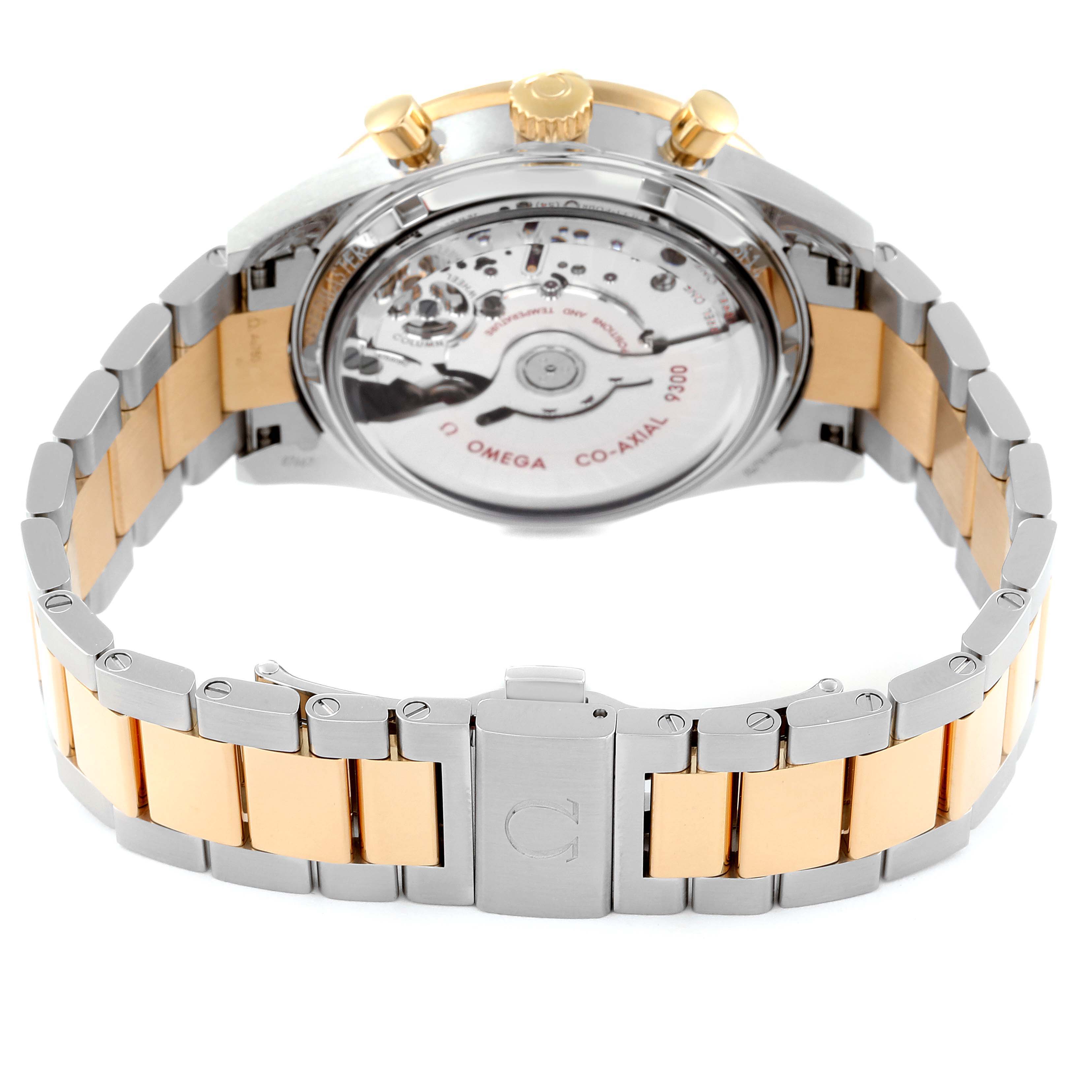 The image shows the back and bracelet of an Omega Speedmaster 331.20.42.51.02.001 Men's Steel and Gold (two tone) White Dial 331.20.42.51.02.001 Men's Steel and Gold (two tone) White Dial watch, highlighting its exposed movement and dual-tone strap.