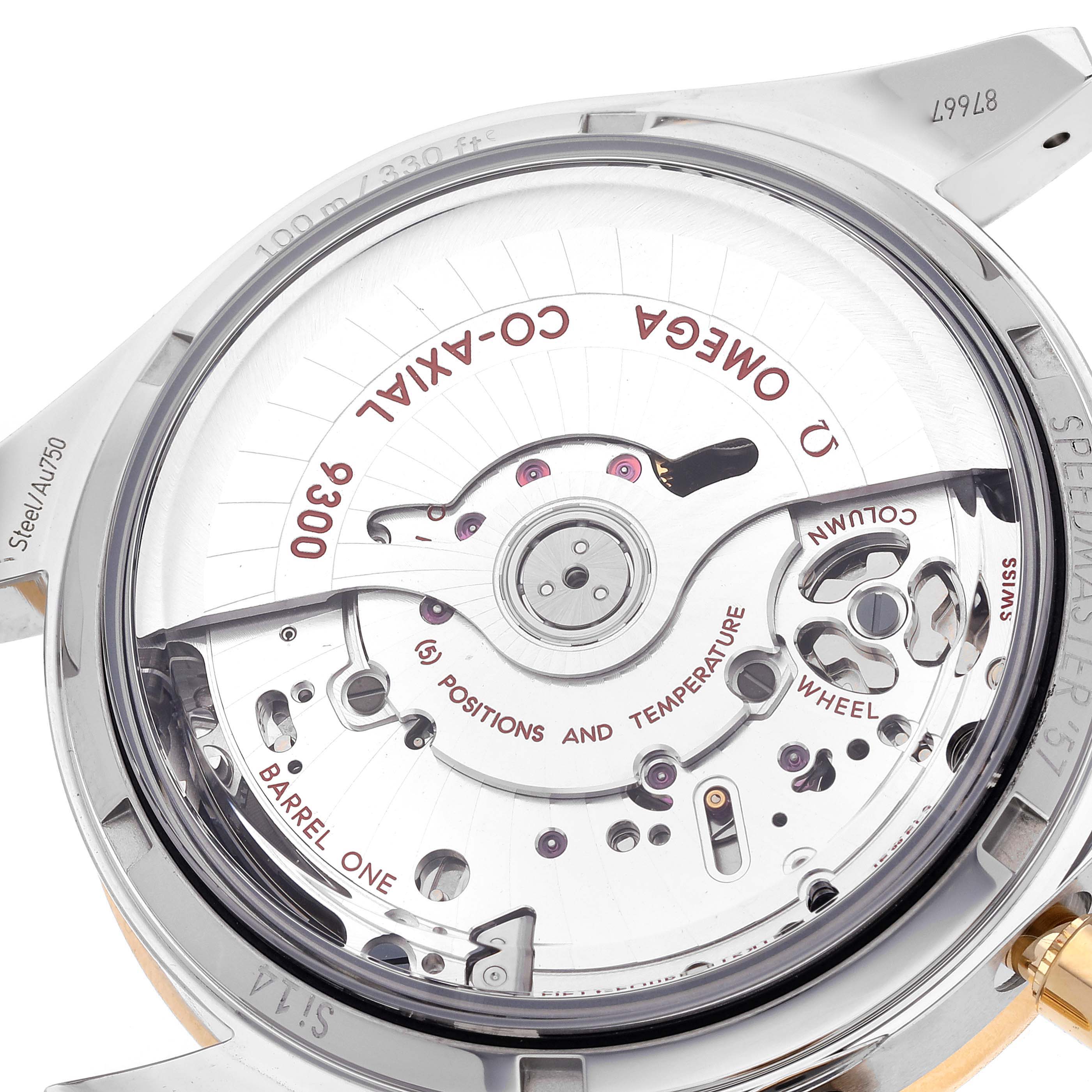 The image shows the back of an Omega Speedmaster 331.20.42.51.02.001 Men's Steel and Gold (two tone) White Dial 331.20.42.51.02.001 Men's Steel and Gold (two tone) White Dial watch, showcasing its Co-Axial 9300 movement and internal components.