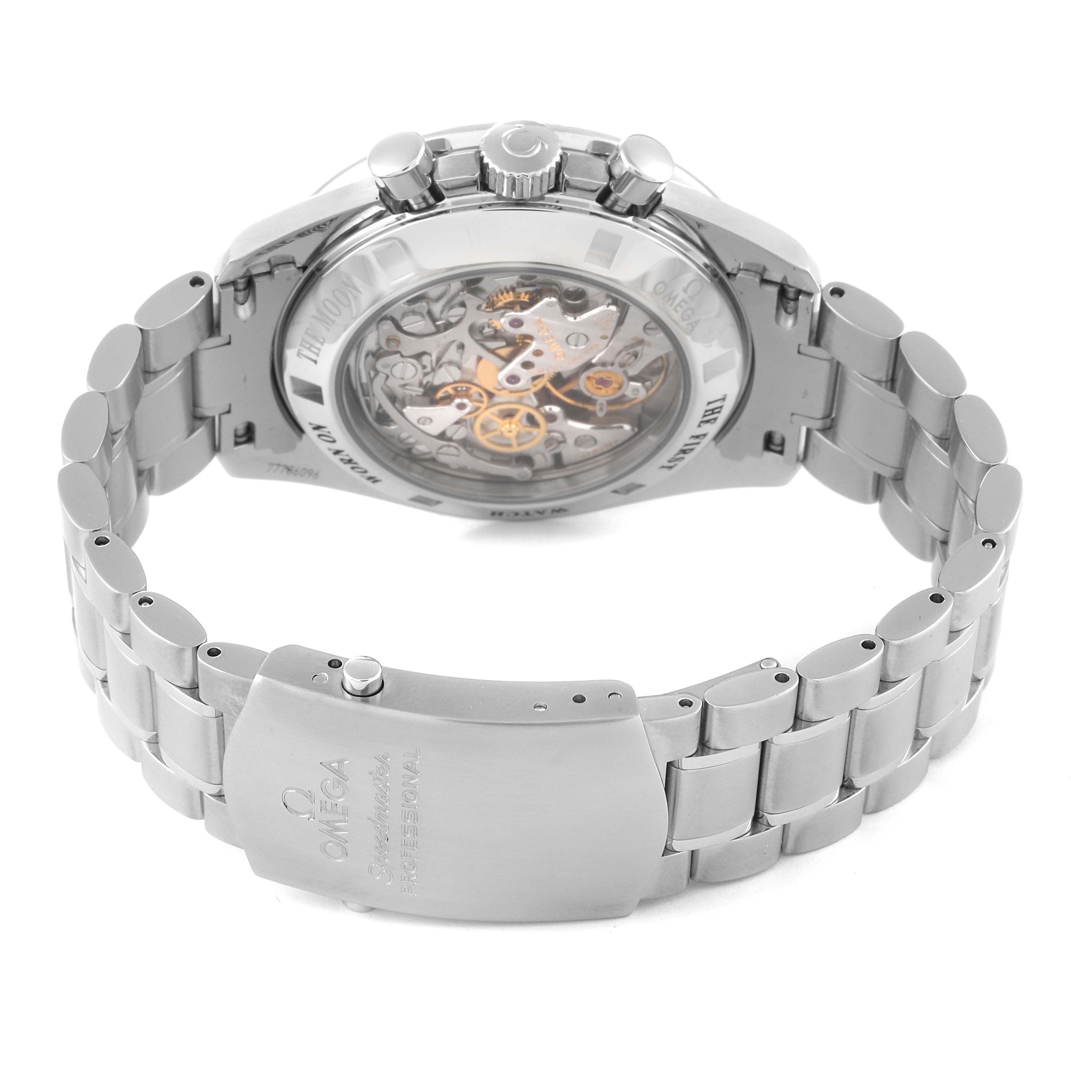 The image shows the back view of an Omega Speedmaster 3576.50.00 Men's Stainless Steel Black Dial 3576.50.00 Men's Stainless Steel Black Dial watch, highlighting its open case back, mechanical movement, and metal bracelet clasp.