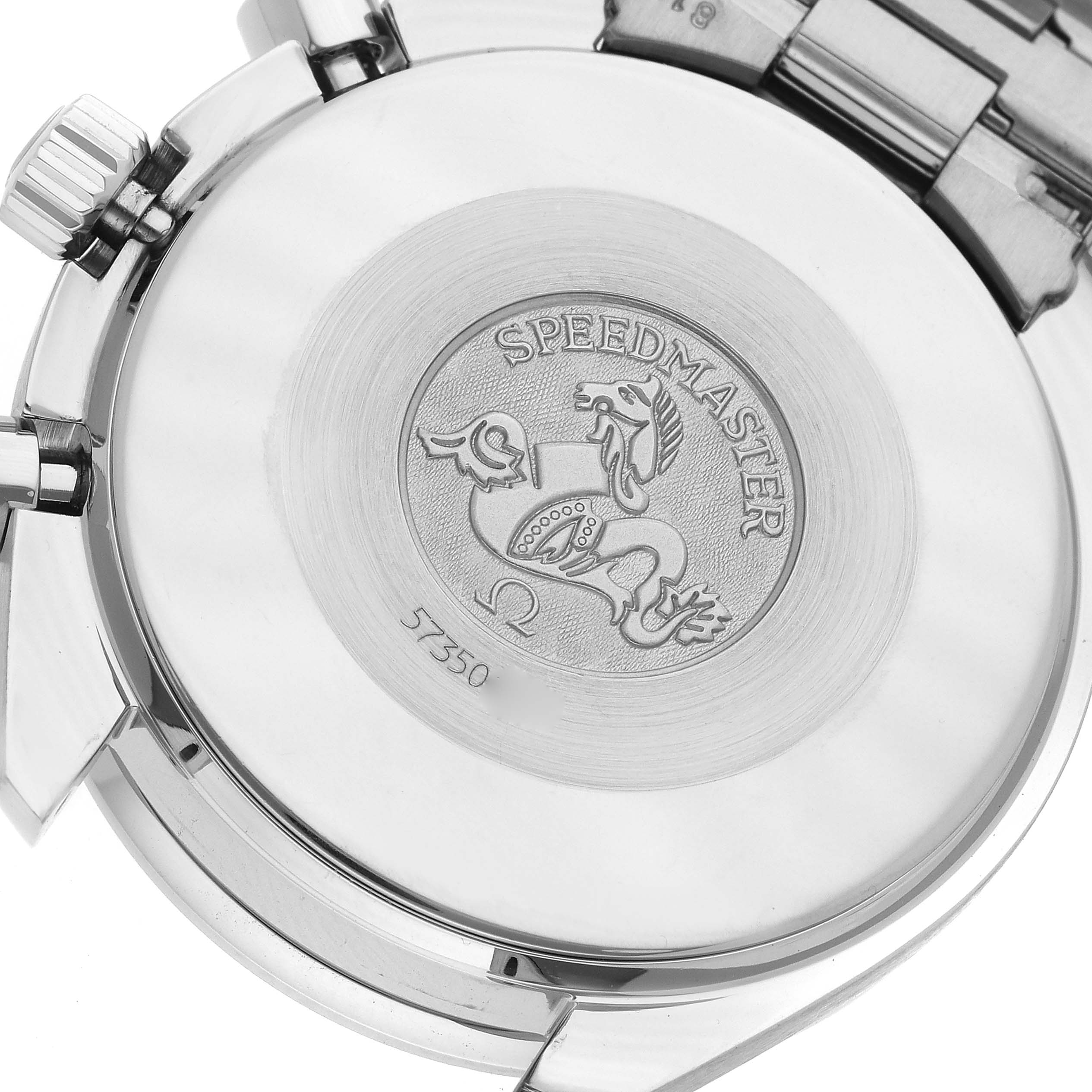 The image shows the case back of an Omega Speedmaster 3510.61.00 Men's Stainless Steel Red Dial 3510.61.00 Men's Stainless Steel Red Dial watch, highlighting the engraved logo and serial number.