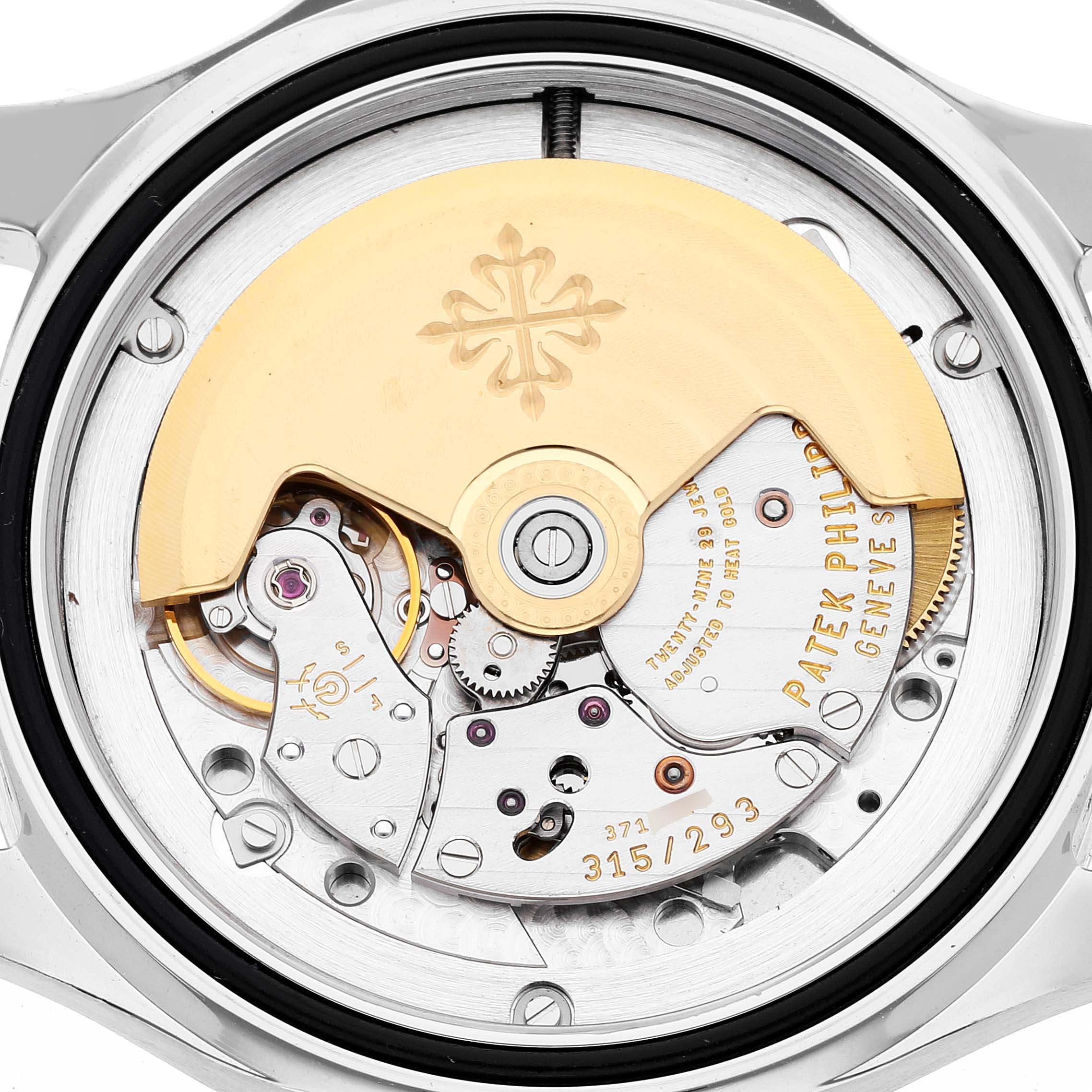 The image shows the back of the Patek Philippe Aquanaut 5165A-001 Men's Stainless Steel Black Dial 5165A-001 Men's Stainless Steel Black Dial watch, revealing its intricate mechanical movement.