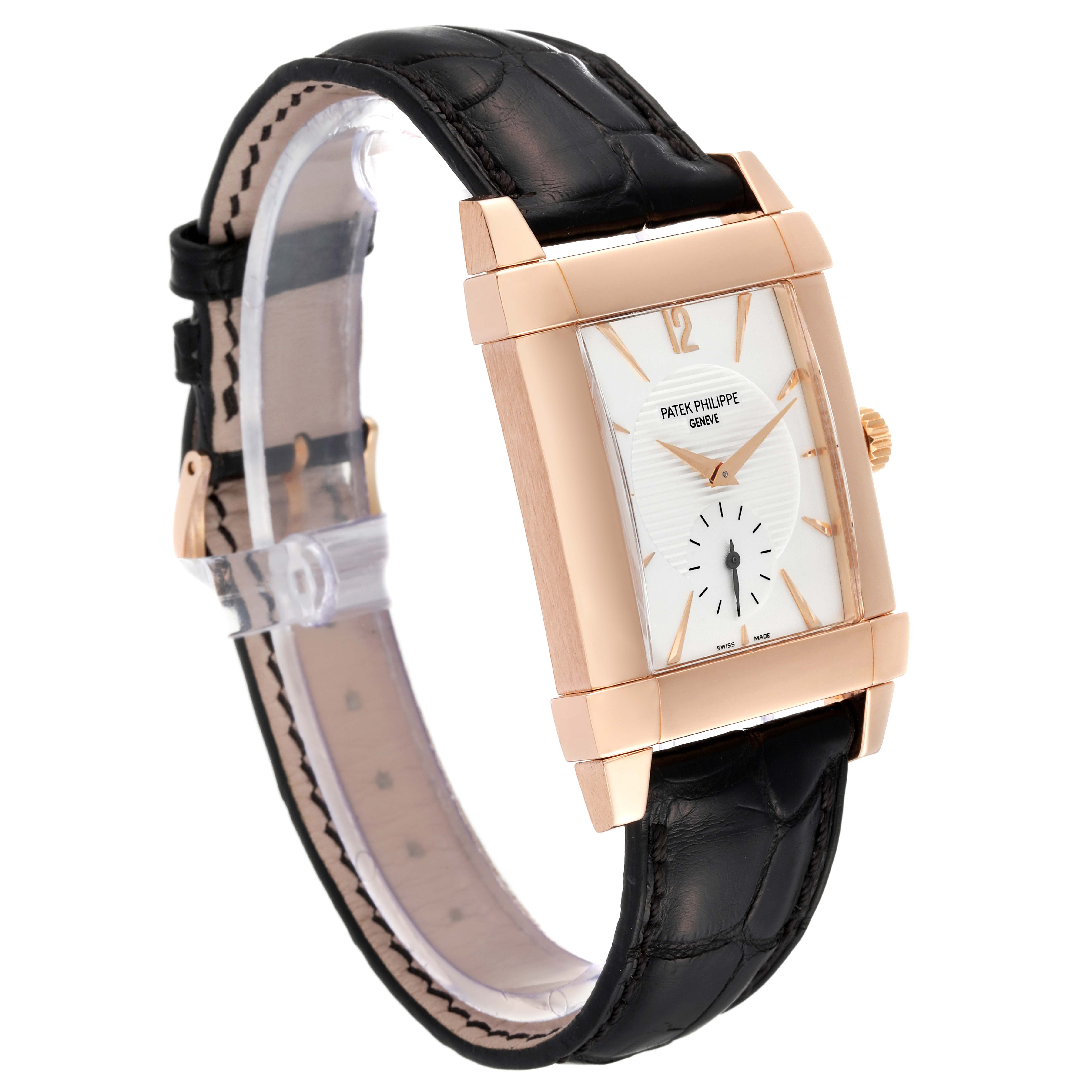 The image shows a side angle view of the Patek Philippe Gondolo 5111R Men
s Rose Gold Silver Dial 5111R Men
s Rose Gold Silver Dial watch, highlighting its rectangular dial and black leather strap.