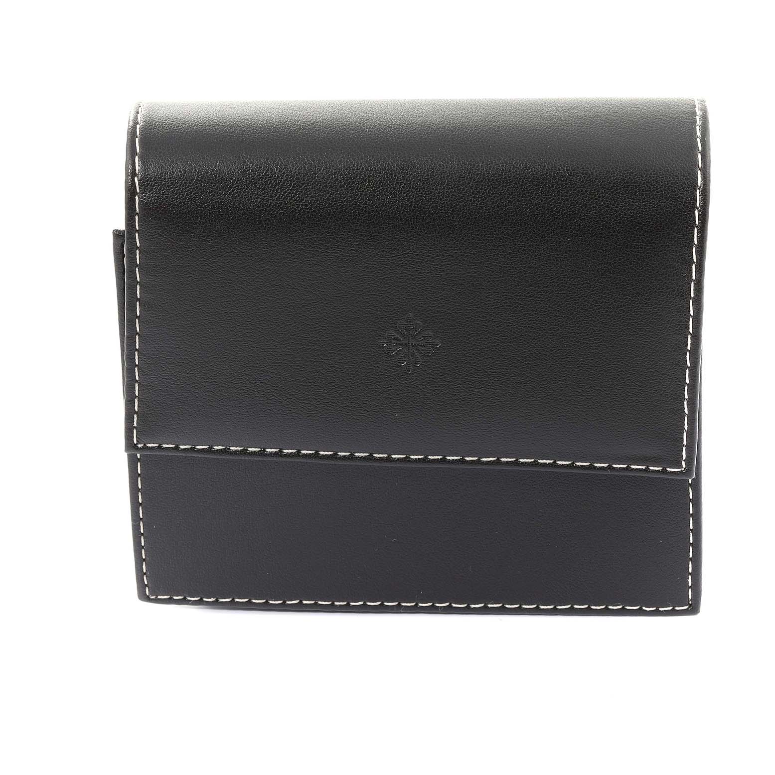 This image shows the black leather carrying case of the Nautilus model by Patek Philippe from the front angle.