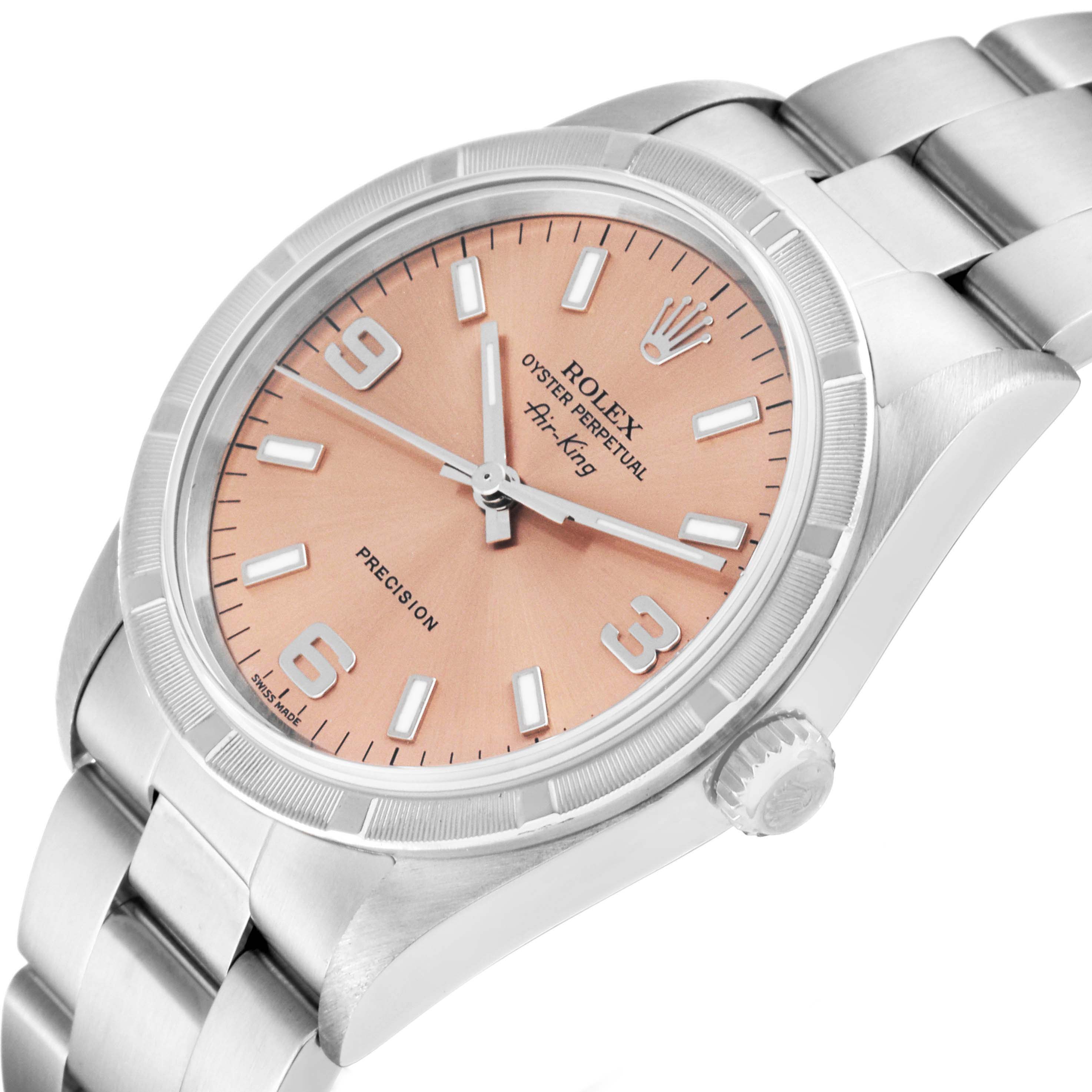 The Rolex Air-King 14010 Men's Stainless Steel Pink Dial 14010 Men's Stainless Steel Pink Dial watch is shown at an angle displaying the dial, crown, bezel, and part of the bracelet.