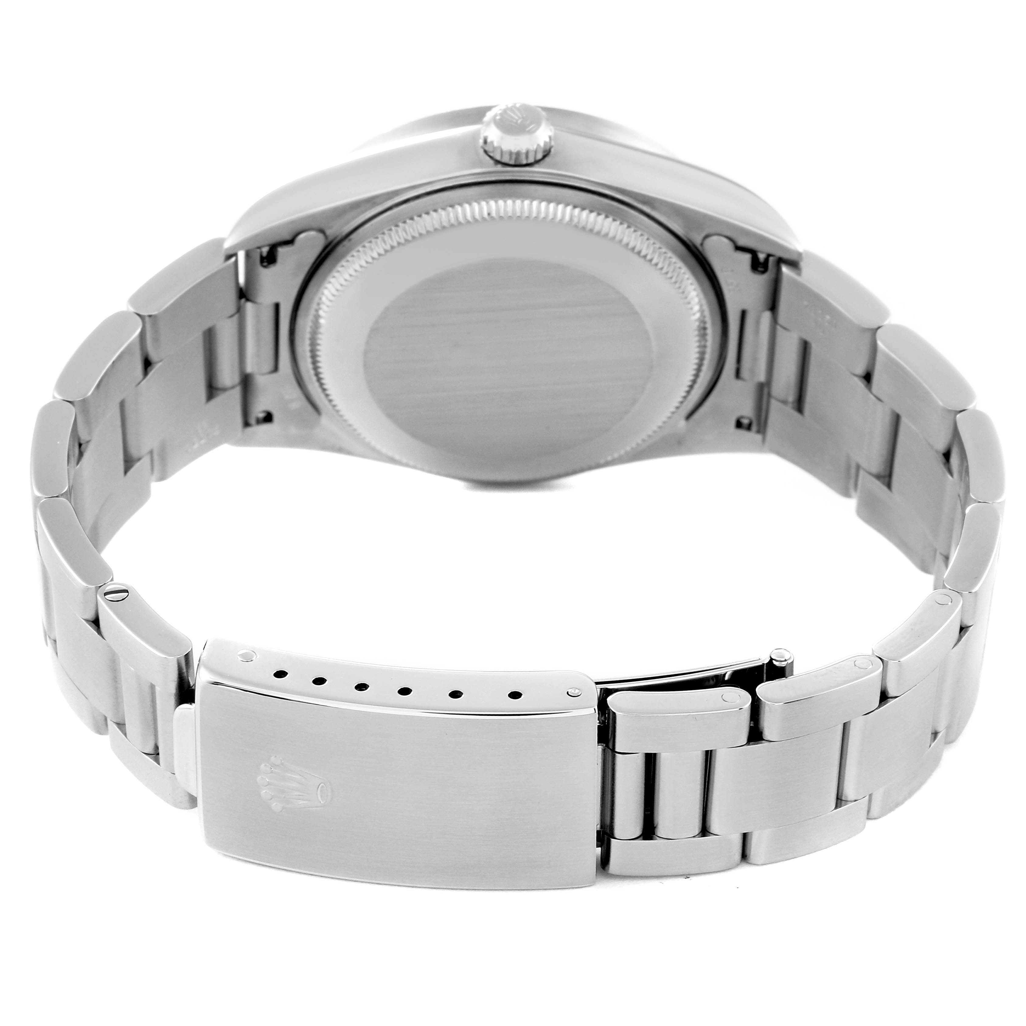 The image shows the backside and bracelet clasp of a Rolex Air-King 14010 Men's Stainless Steel Pink Dial 14010 Men's Stainless Steel Pink Dial watch.