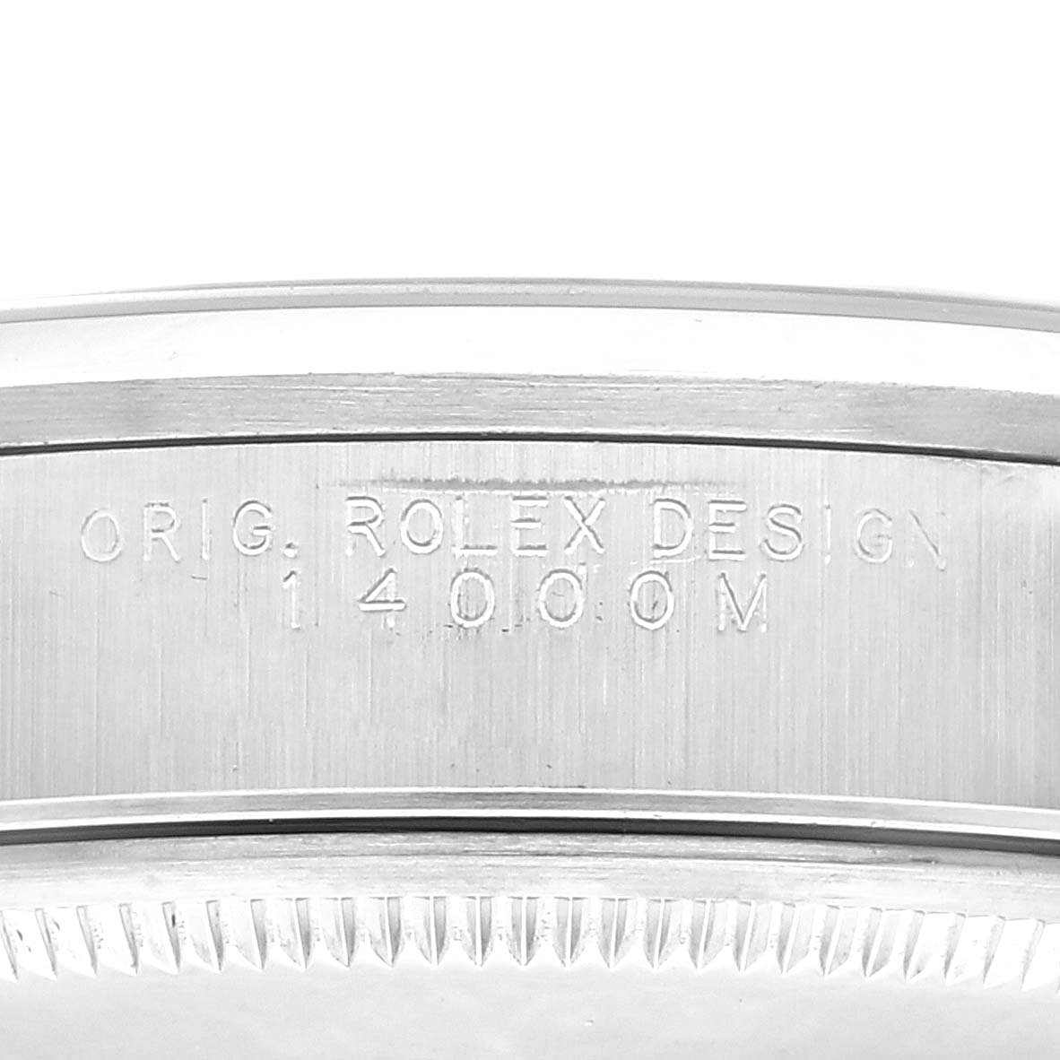 The image shows an engraving on the side of the casing for the Rolex Air-King 14000 Men's Stainless Steel Black Dial 14000 Men's Stainless Steel Black Dial watch with the text "Orig. Rolex Design 14000M."