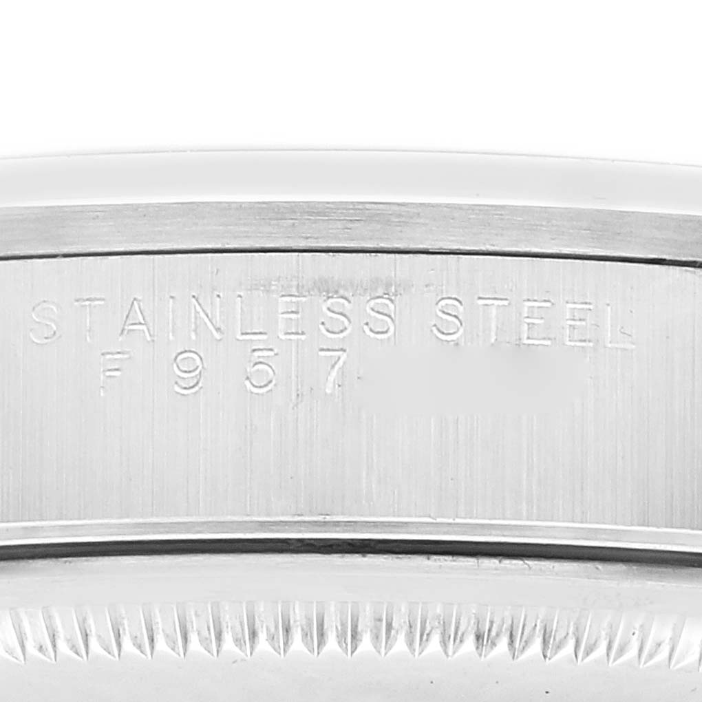 This image shows a close-up of the engraved stainless steel back casing of a Rolex Air-King 14000 Men's Stainless Steel Black Dial 14000 Men's Stainless Steel Black Dial watch.