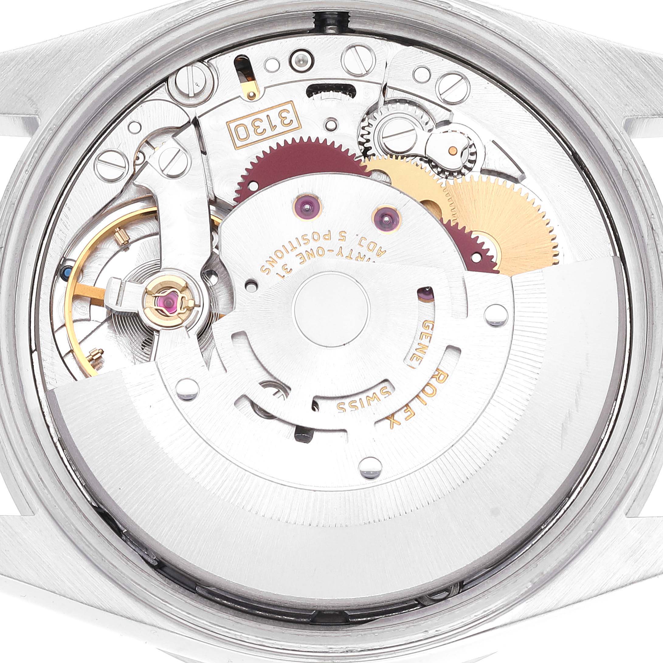This image shows the internal mechanism of the Rolex Air-King 14010 Men's Stainless Steel Blue Dial 14010 Men's Stainless Steel Blue Dial watch from a close-up rear angle, highlighting gears and components.