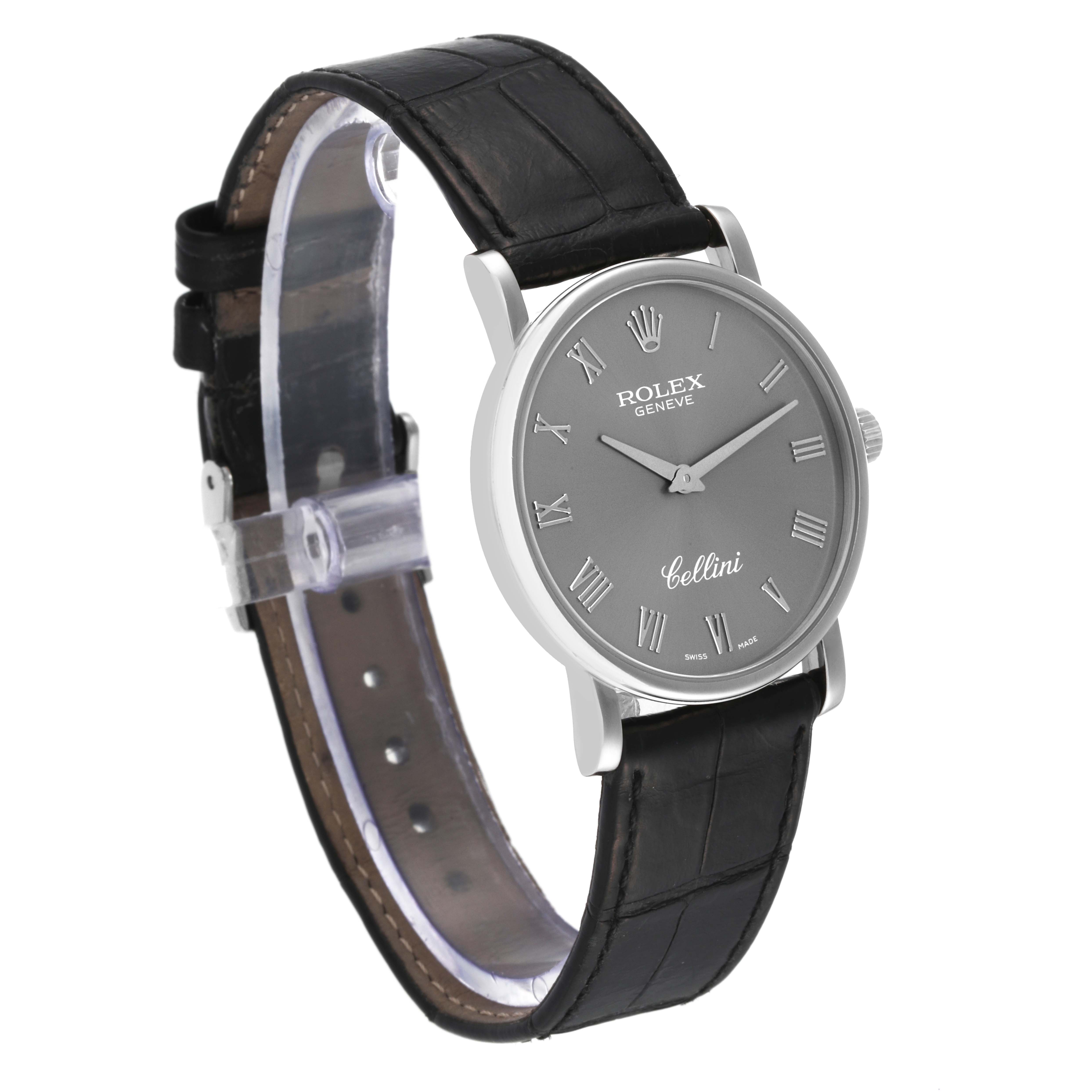 The image shows a Rolex Cellini 5115 Men's White Gold Grey Dial 5115 Men's White Gold Grey Dial watch at a slight angle, highlighting its round dial, Roman numerals, and leather strap.