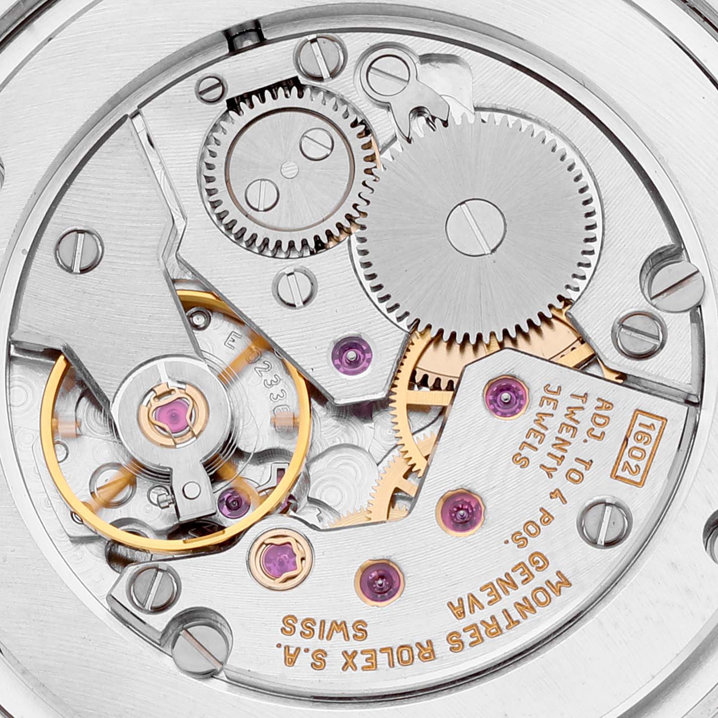 The image shows a close-up of the intricate movement mechanism of a Rolex Cellini 5115 Men's White Gold Grey Dial 5115 Men's White Gold Grey Dial watch.