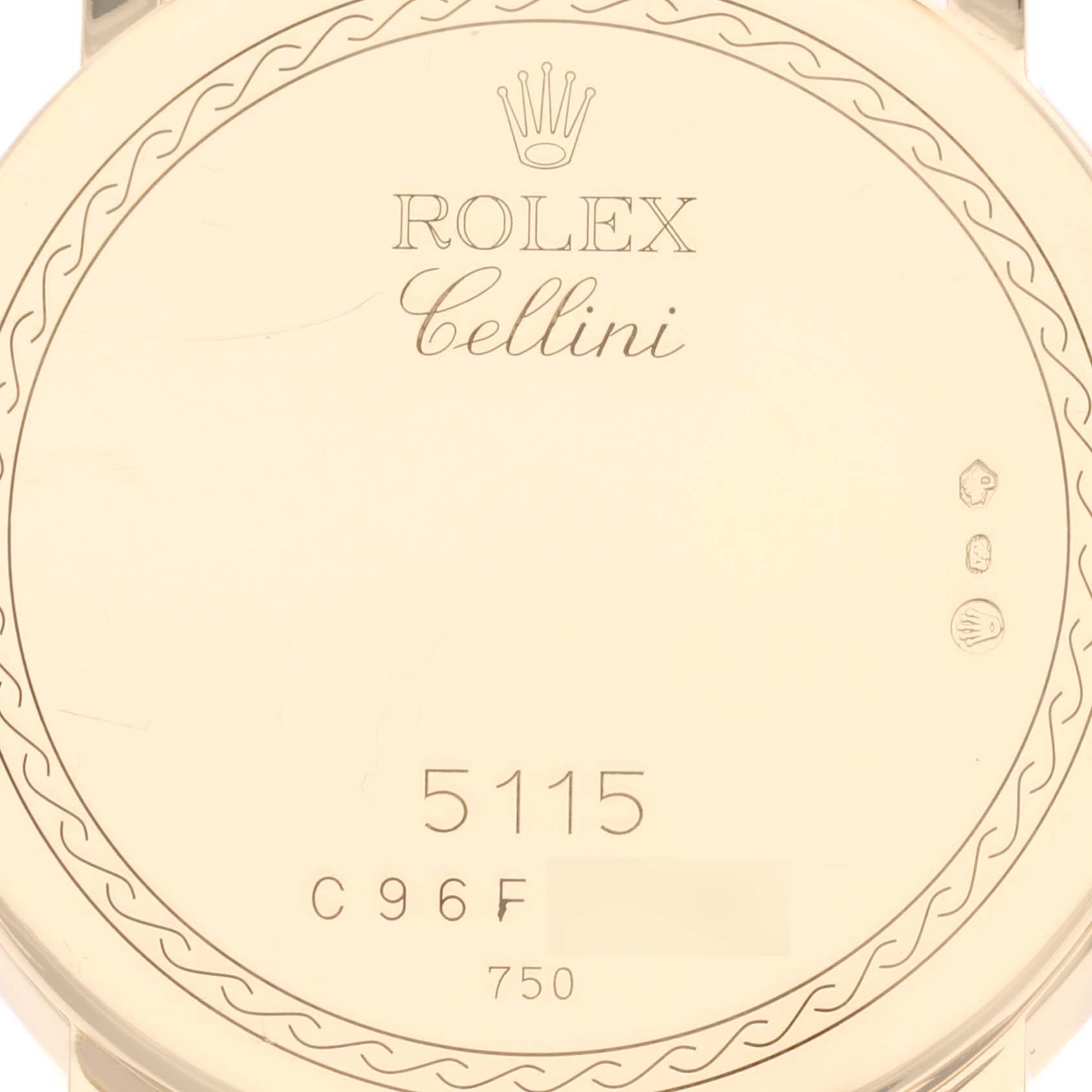 The image shows the back case of a Rolex Cellini 5115 Men's Yellow Gold Champagne Dial 5115 Men's Yellow Gold Champagne Dial watch, featuring the brand logo, model number, and hallmark stamps.