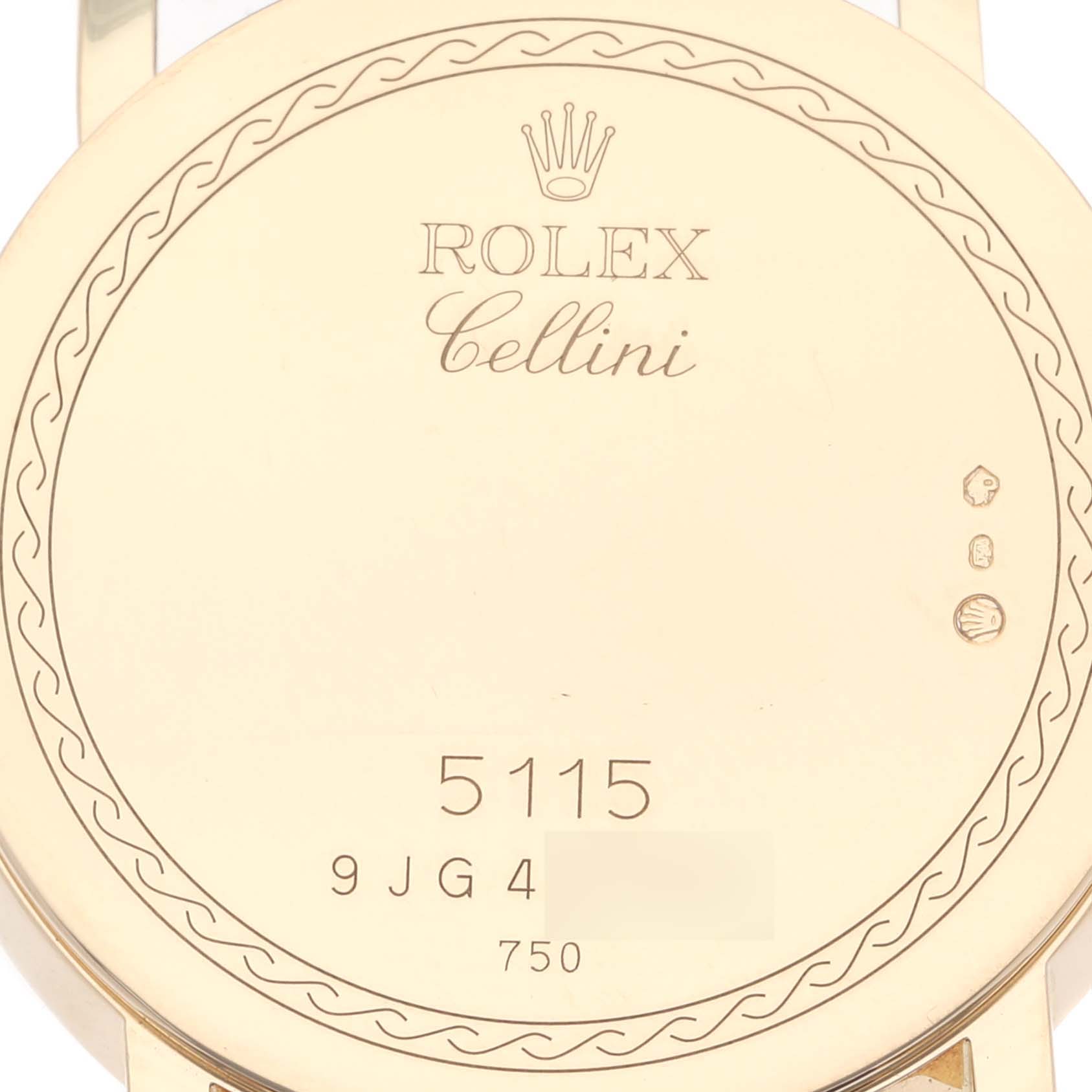 The image shows the back case of a Rolex Cellini 5115/8 Men's Yellow Gold White Dial 5115/8 Men's Yellow Gold White Dial model watch, featuring engravings and the model number.