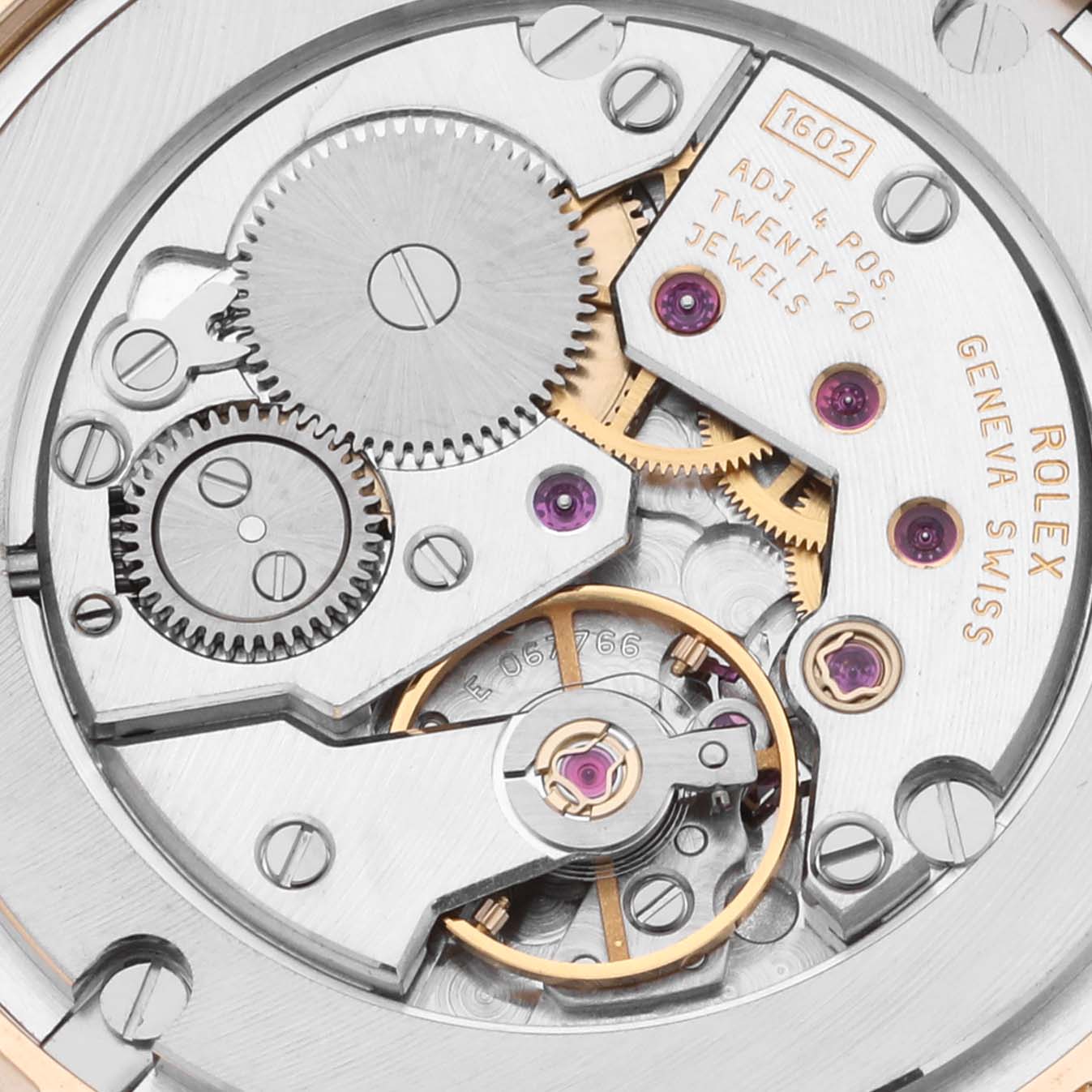 This image shows a close-up view of the intricate inner mechanism of a Rolex Cellini 5115/8 Men's Yellow Gold White Dial 5115/8 Men's Yellow Gold White Dial watch.