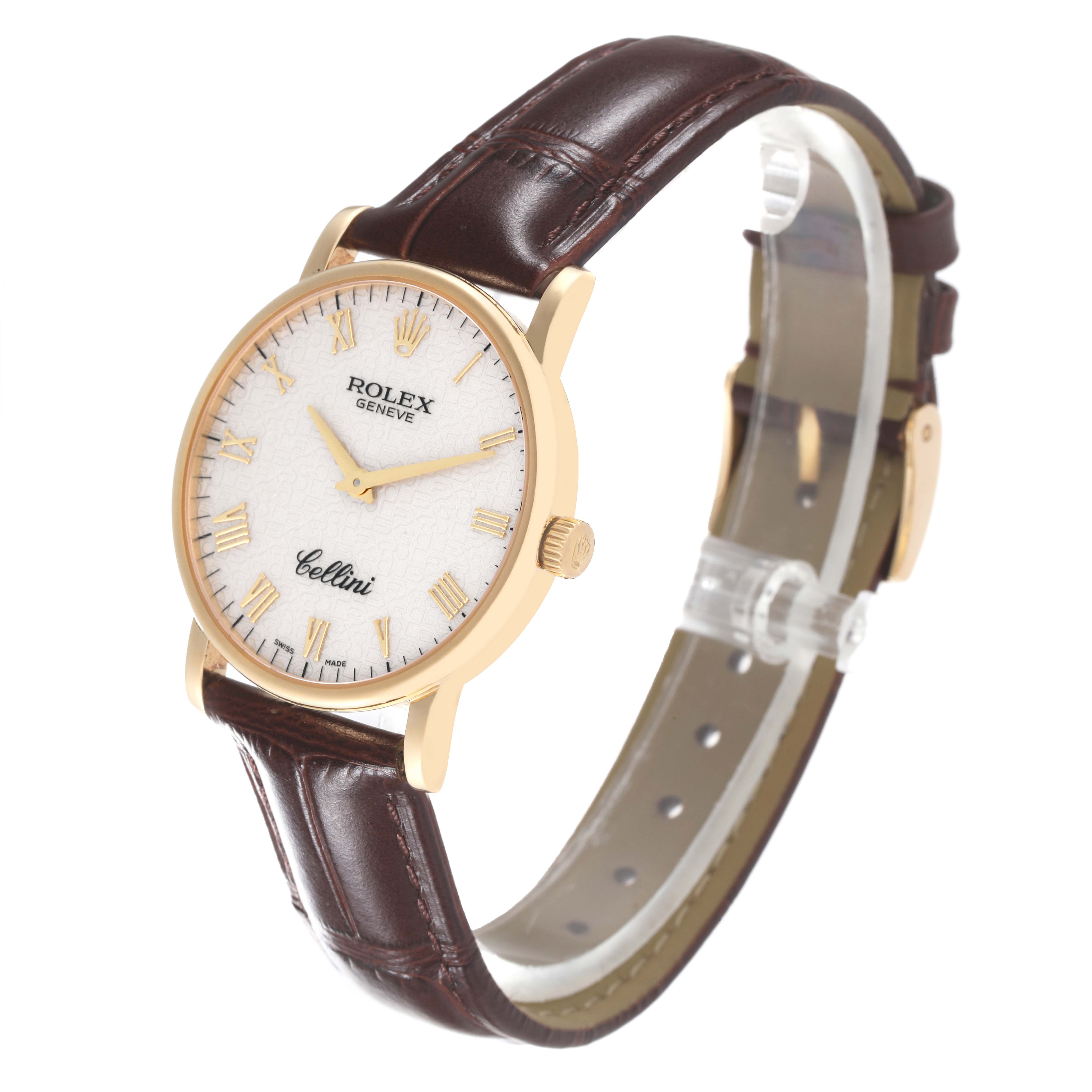 The Rolex Cellini 5115/8 Men's Yellow Gold White Dial 5115/8 Men's Yellow Gold White Dial watch is shown at a three-quarter angle, displaying its face, leather strap, and gold bezel.